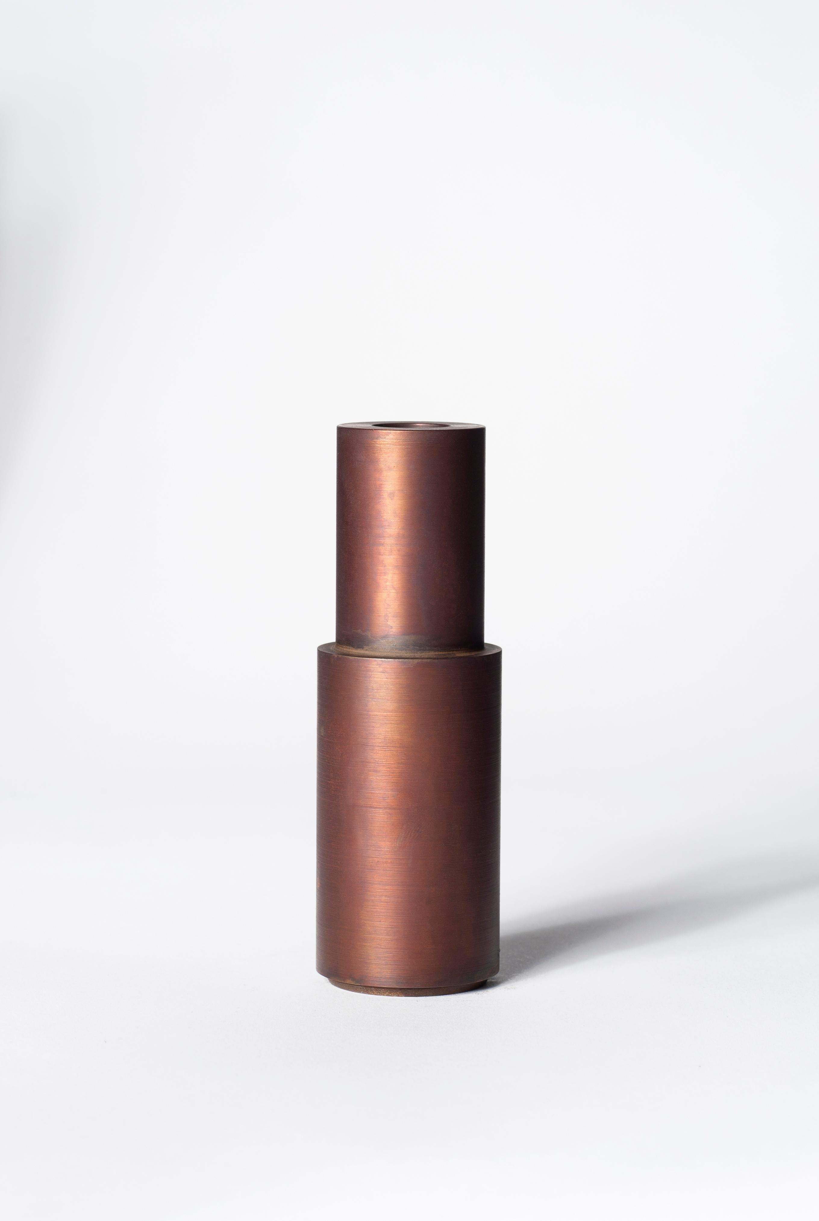 Brown patina steel candlestick by Lukasz Friedrich.
Dimensions: D 5 x H 15 cm
Materials: Brown patina on steel.