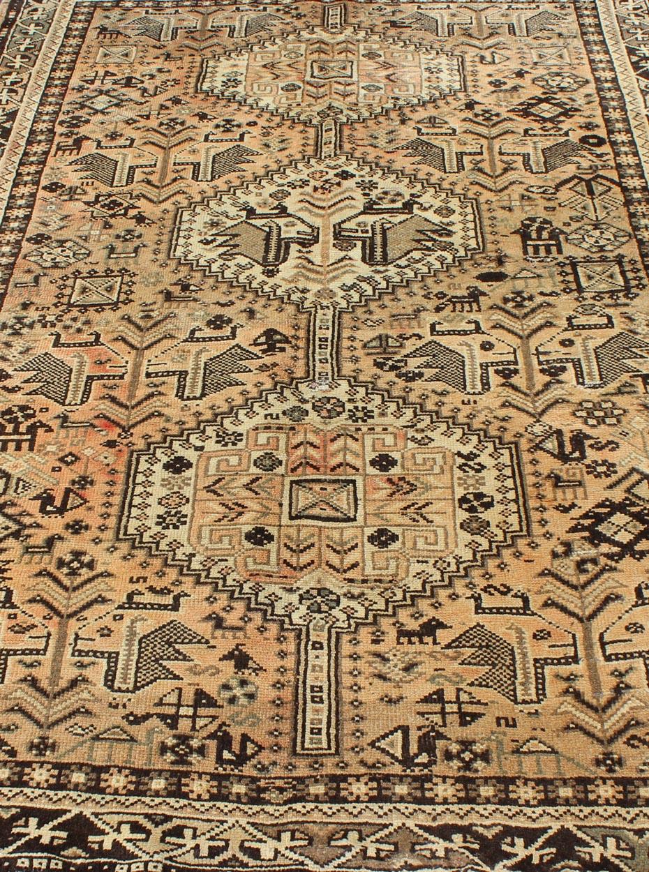 Brown Peach Vintage Persian Shiraz Rug with Vertical Sub-Geometric Medallions In Good Condition For Sale In Atlanta, GA