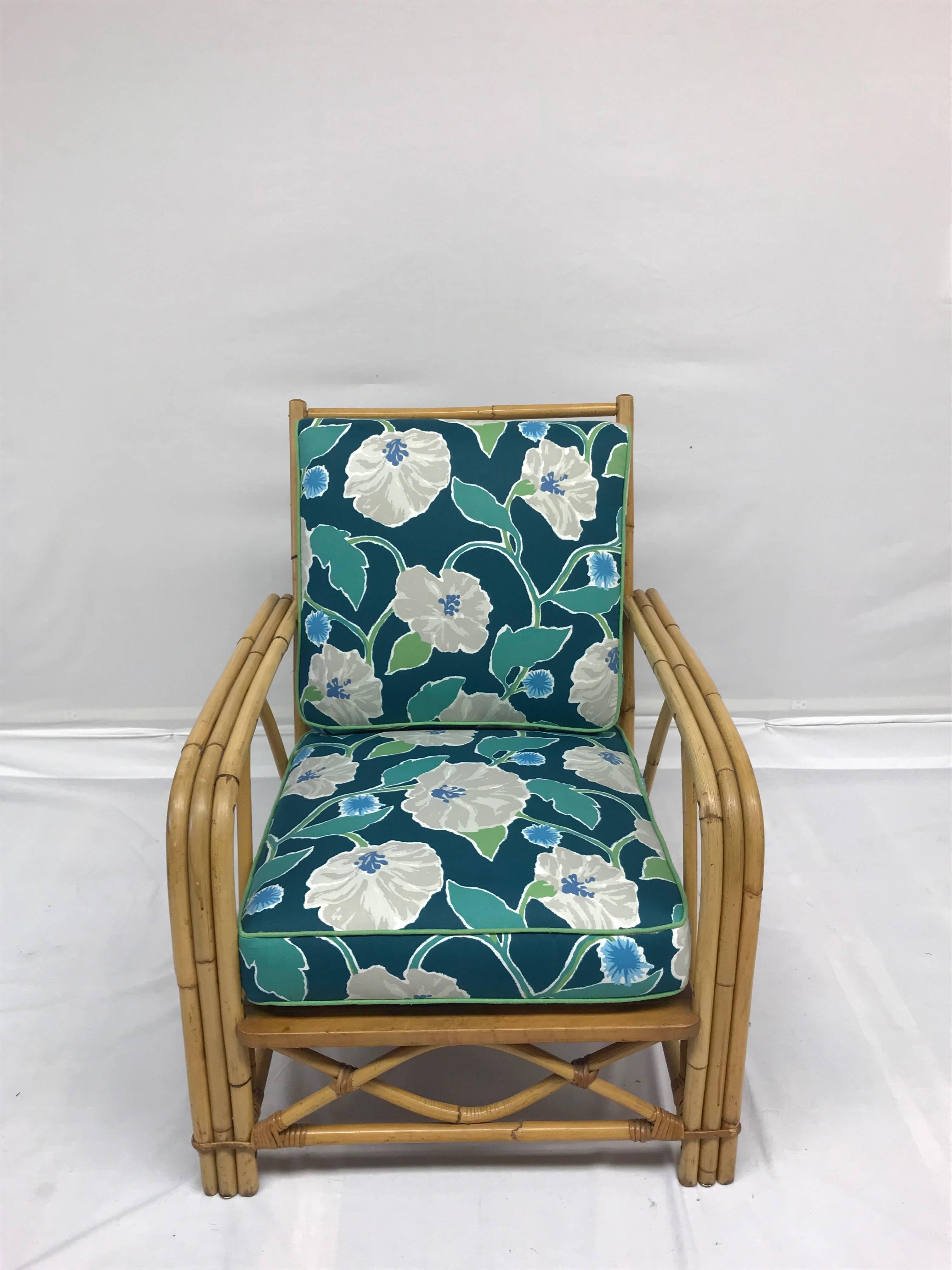A super-comfortable vintage rattan armchair and ottoman from Ficks Reed newly upholstered in our shop for Robert Allen Home fabric Jungle Bloom polished cotton. Kick back with a good book and a fruity cocktail, and settle in for bliss. Perfect for a