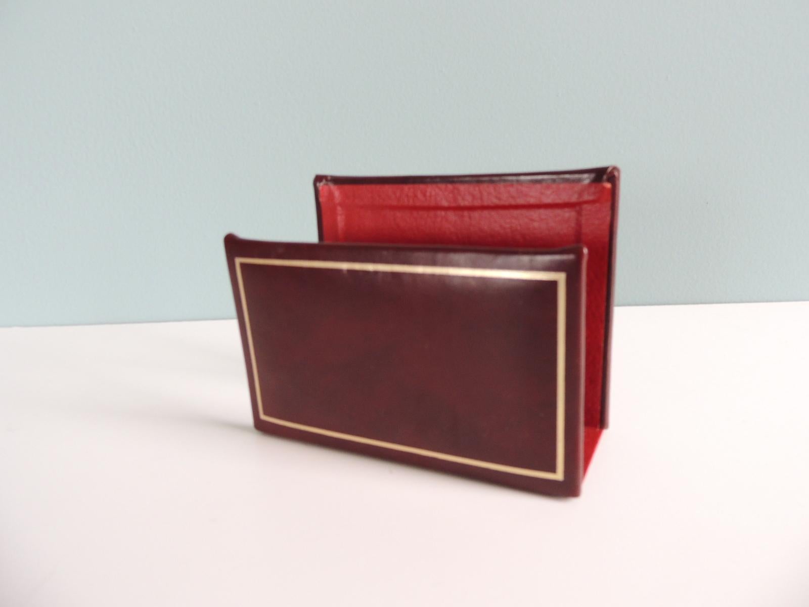 Brown Reddish leather stationary or letter holder
Gold detail embossed leather.
Stamped: 