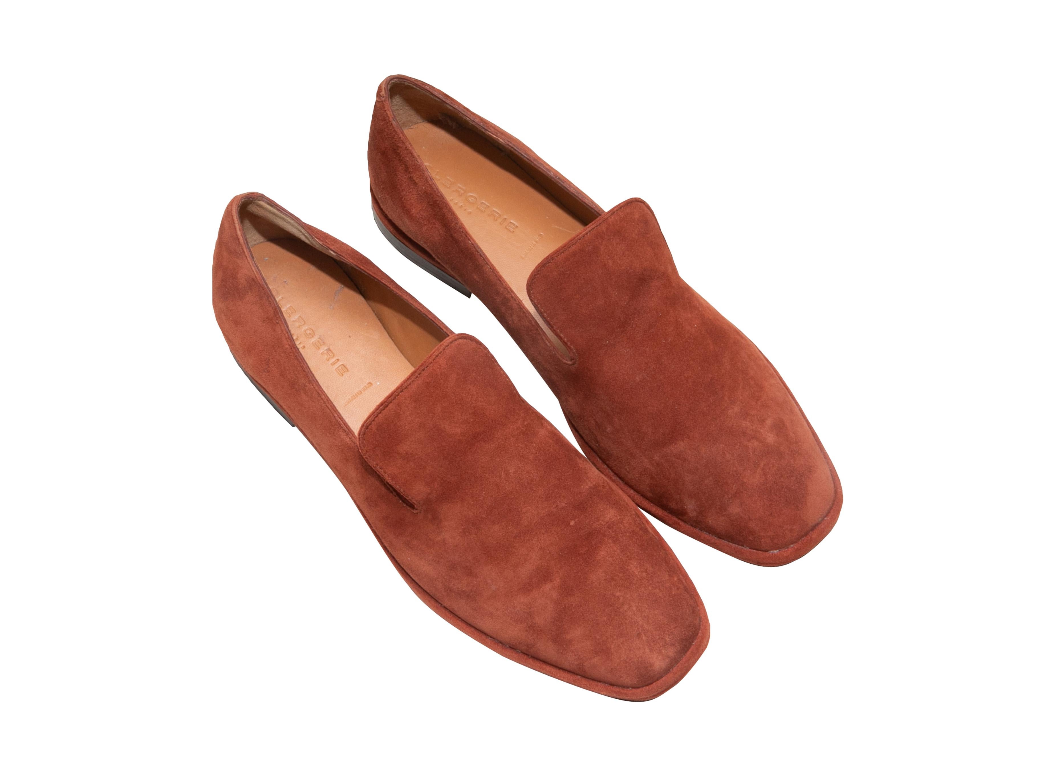 Product Details: Brown suede loafers by Robert Clergerie. Stacked heels. 1