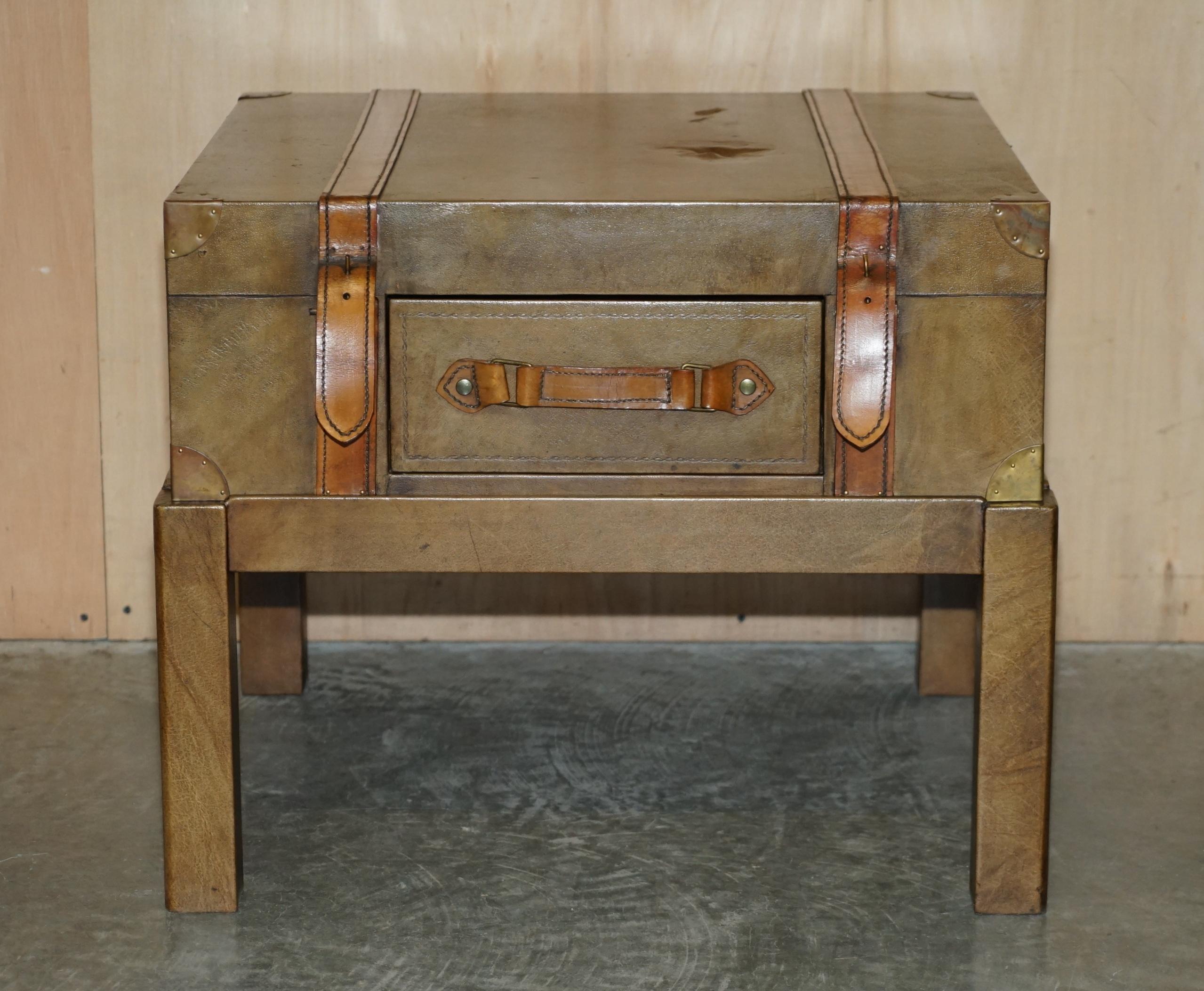 Royal House Antiques

Royal House Antiques is delighted to offer for sale this brown leather trunk / suitcase coffee table with one drawer

Please note the delivery fee listed is just a guide, it covers within the M25 only for the UK and local