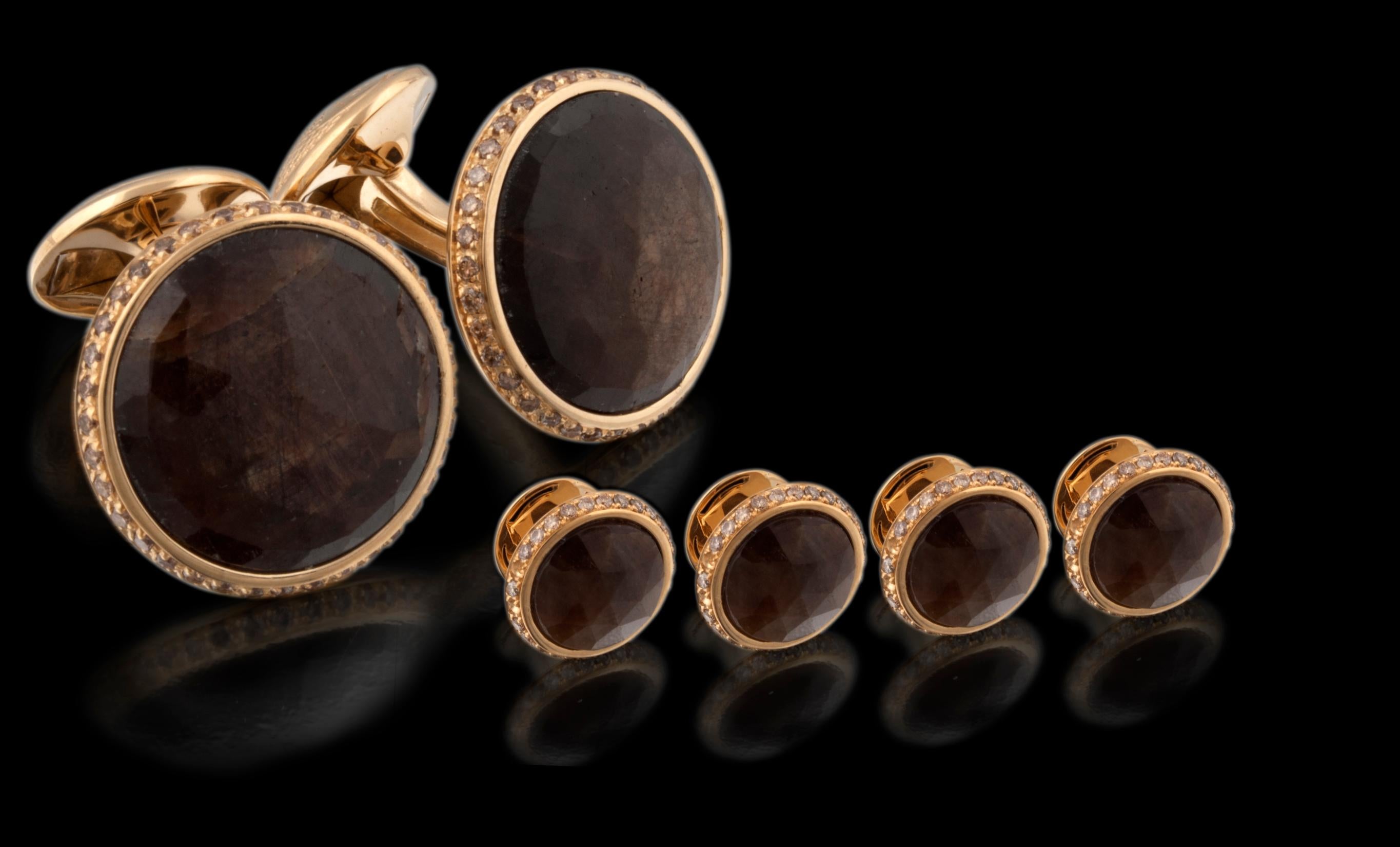 Faceted cabochons of semi-precious and precious stones have been immaculately set within a perfect bezel setting, decorated with exquisite diamonds, scattered, framing the stone. A classic collection of cufflinks that will remain timeless, to pass