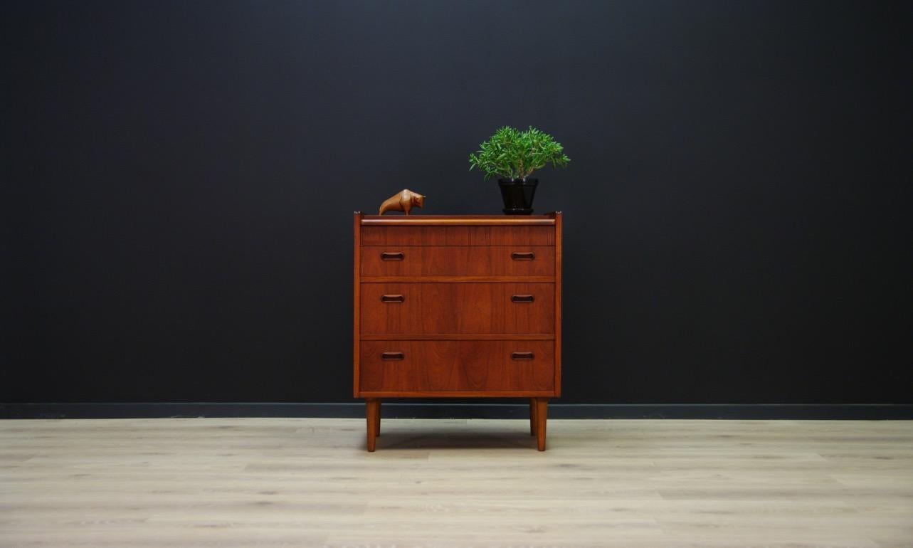 Original secretaire, commode from the 1960s-1970s. Secretaire covered with teak veneer, legs made of solid teak. It has numerous drawers and a raised top on which the mirror is mounted. Preserved in good condition (visible ding and scratches, filled