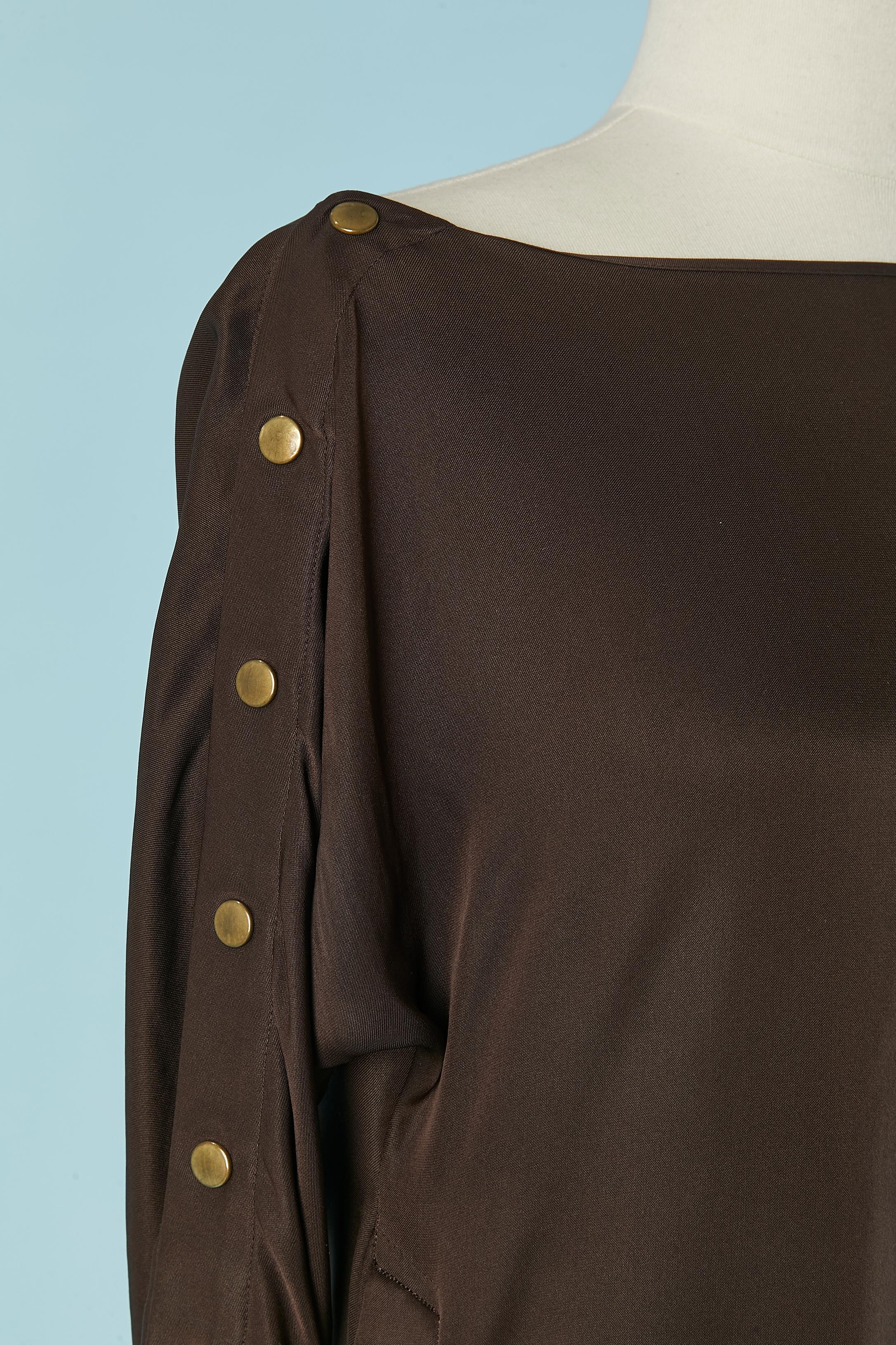 Brown silk dress with gold metal snaps on the sleeve and on both side of the dress 
SIZE 40 (Fr) M 