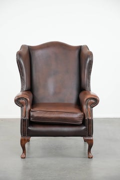 Brown smooth cow leather Chesterfield wingback armchair in English style