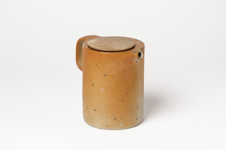 XXth midcentury 

Elegant stoneware ceramic tea pot 

Realised circa 1970

Brown stoneware ceramic wood firing color

Original perfect condition

Measures: Height : 17cm, large : 18cm, depth : 13cm.