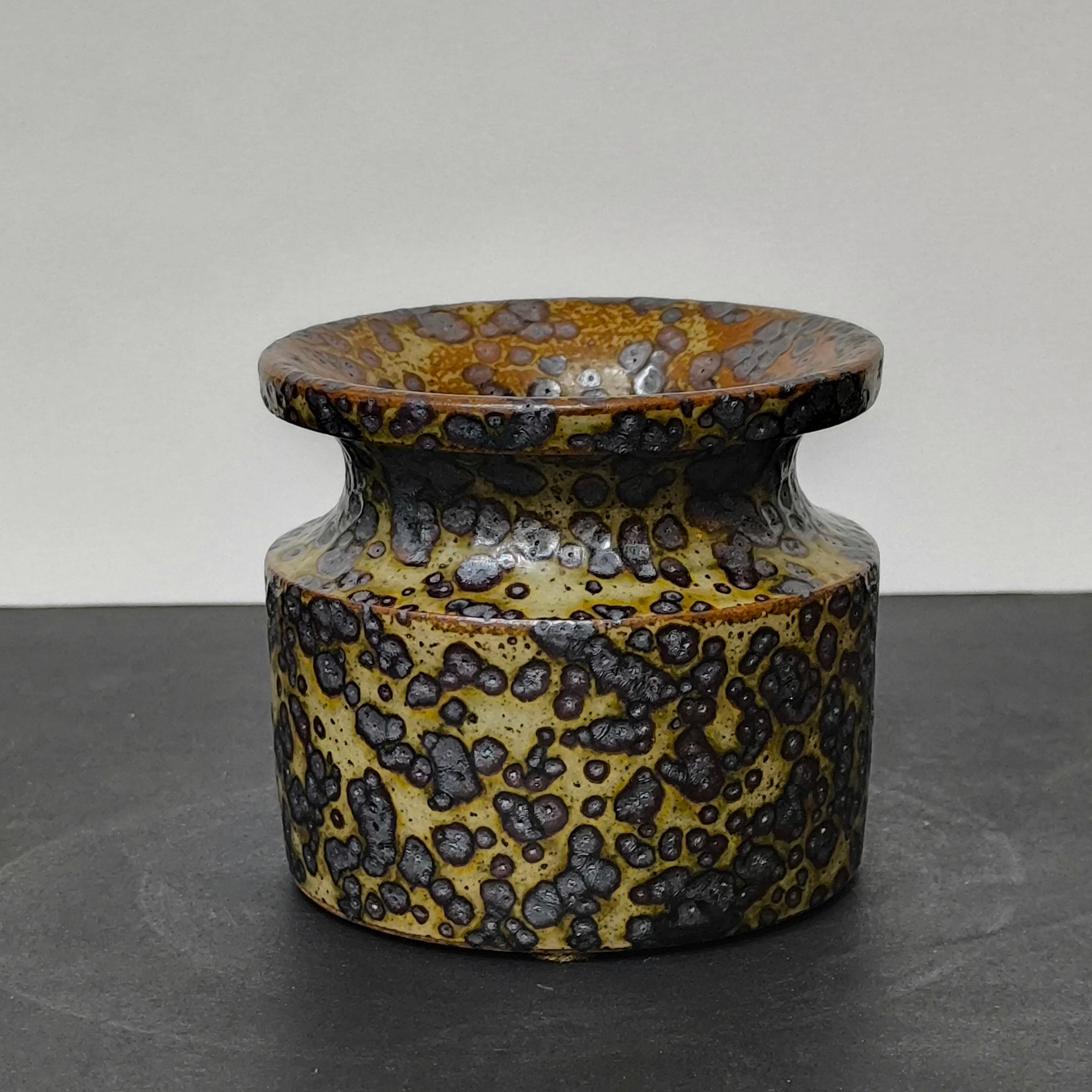 Stoneware jar by Claes Thell.
Claes Thell owm Studio in Höganäs,  Sweden, 1978.
A glaze of particular refinement with a spectacular arrangement of patterns during firing, 
completely typical for this great ceramist, made in his own studio in