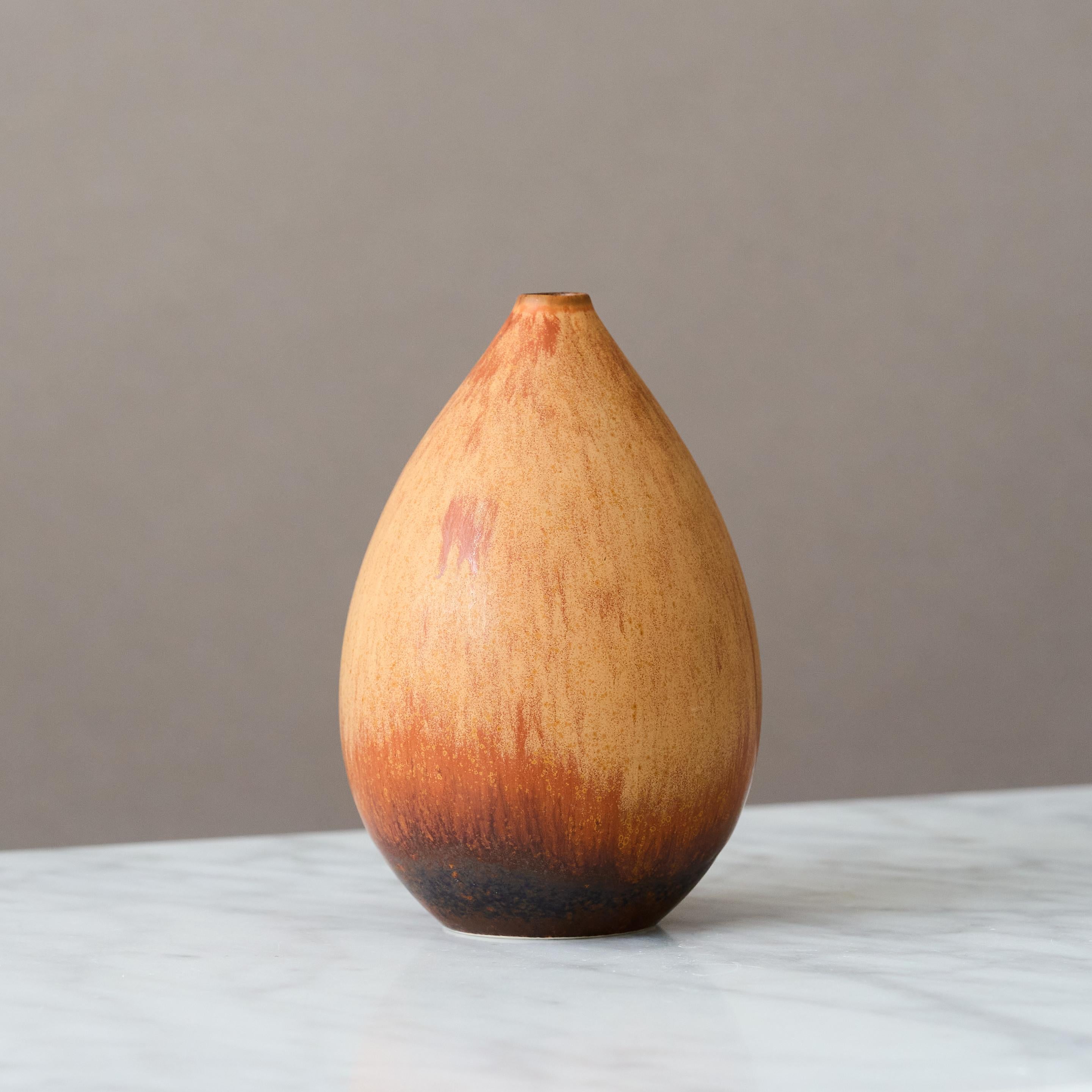 A beautiful stoneware vase with amazing glaze.
Designed by Carl-Harry Stålhane at Rörstrand, Sweden, 1955.

Good condition, slightly askew. Factory second.
Signed 'CHS' and makers mark 'R'.

Carl-Harry Stålhane (1920-1990) is one of the most