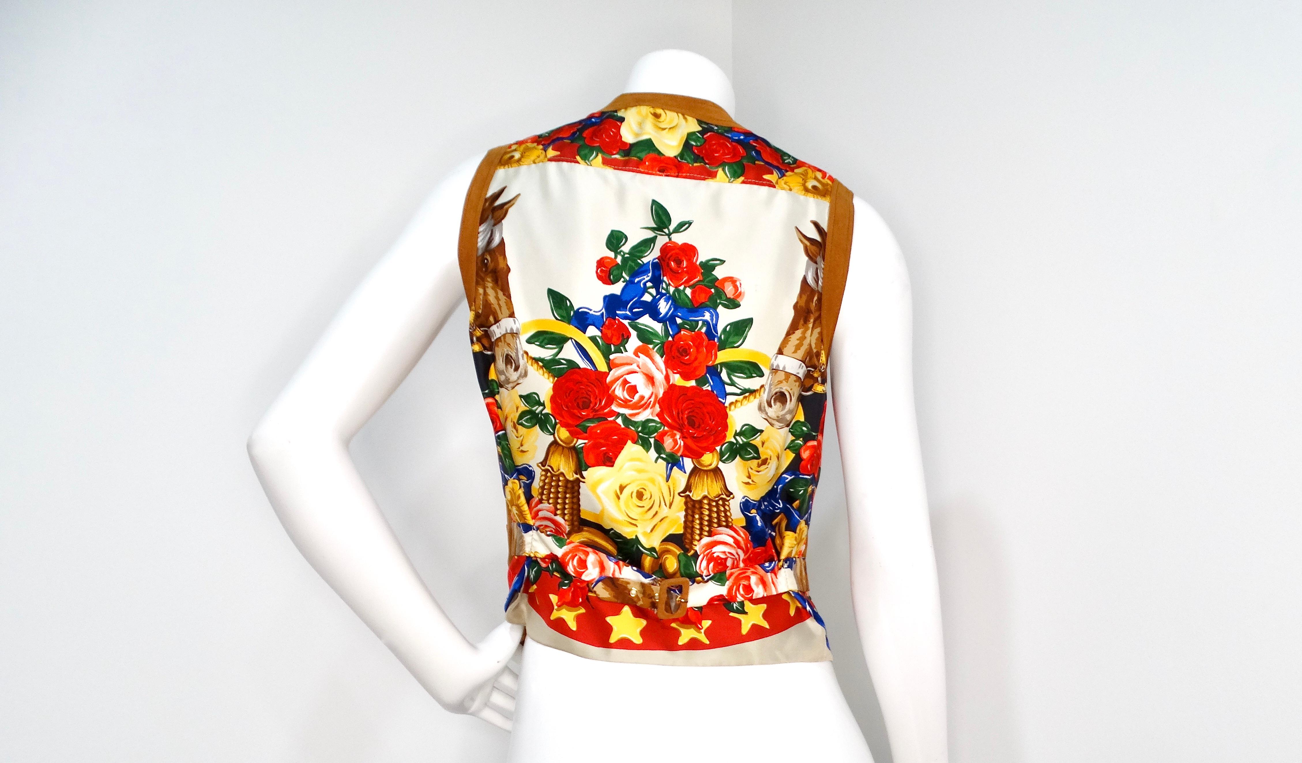 The Brown Suede and Silk Printed Horse & Flower Motif Vest is a unique piece that effortlessly combines luxury with an adventurous spirit. The front showcases rich brown suede, adorned with elegant gold-toned buttons that add a touch of
