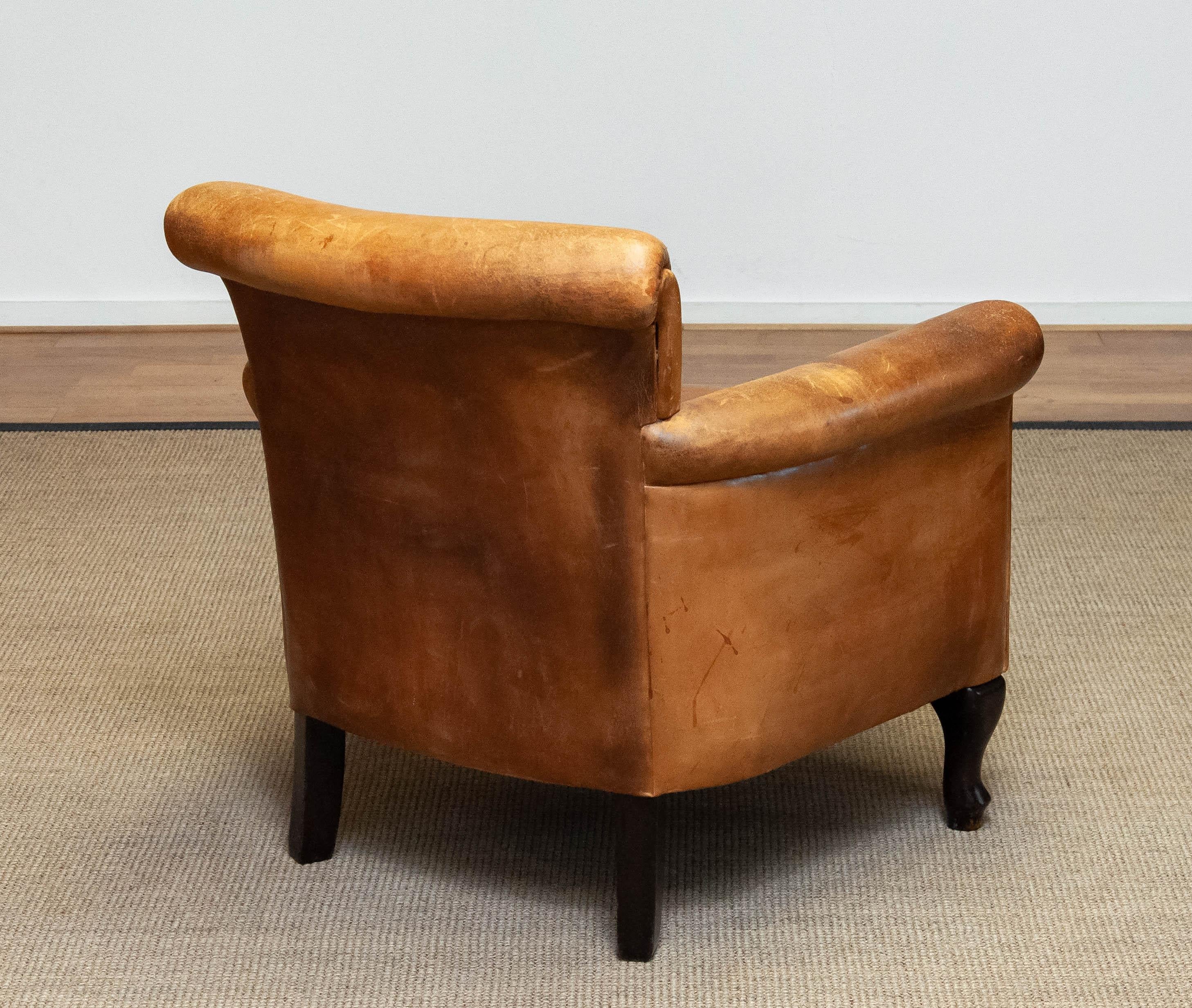 Milieu du XXe siècle 1960s Brown / Tan French Art Deco 'Sheep' Roll Back Leather Lounge / Club Chair en vente