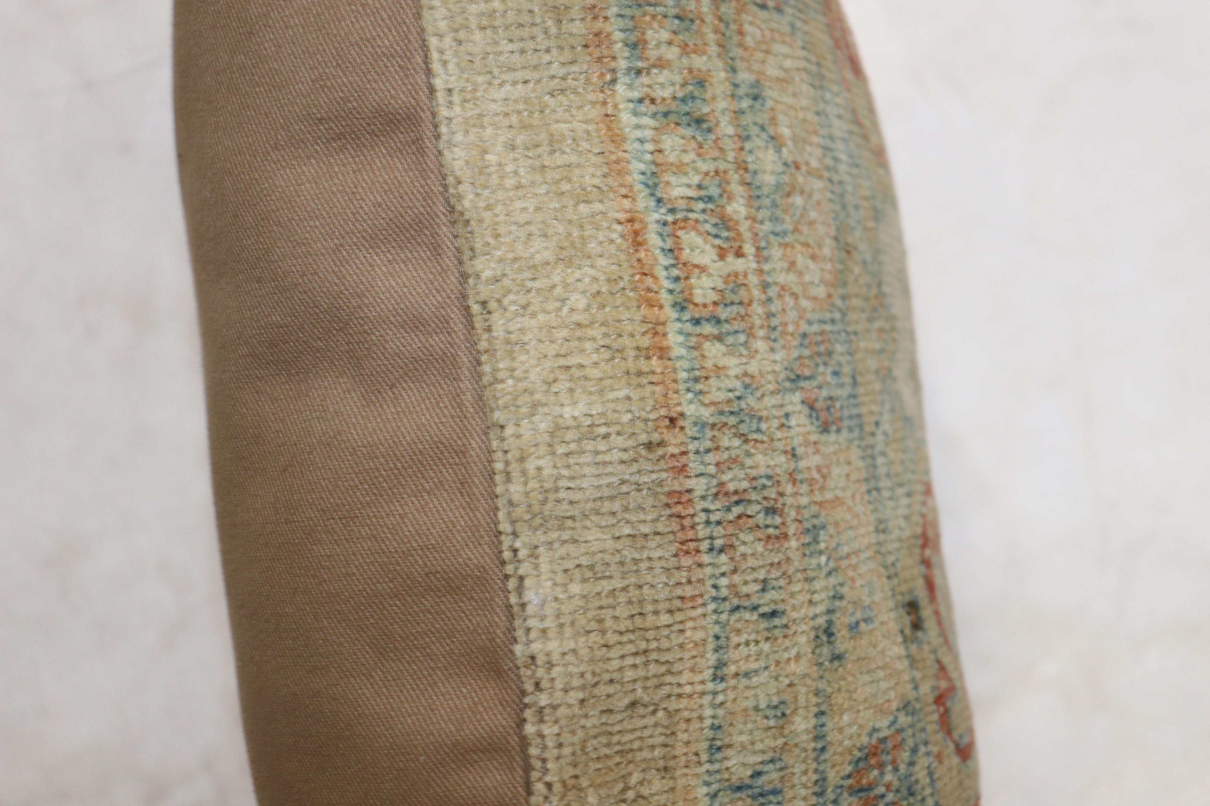 Larger lumbar size pillow made from a 20th century Persian Serab rug. Zipper close, poly-fill insert provided

Measures: 16” x 24”.