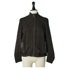 Brown textured jacket with black leather pocket edge and zip closure Chanel 