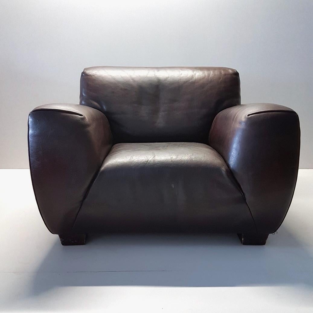 Brown thick high quality leather lounge chair by Molinari (marked).
Model fat boy.
With a beautiful patina.
 