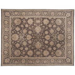 Tapis traditionnel pakistanais marron à motifs floraux