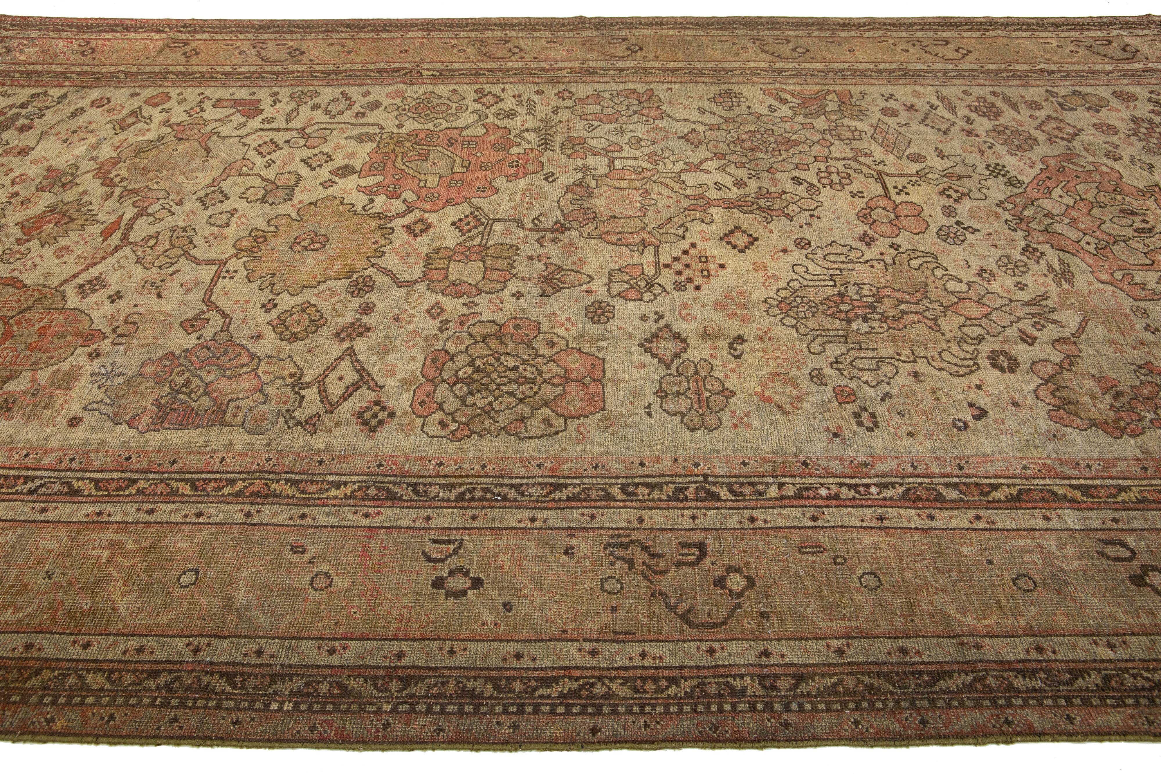 Late 19th Century Brown Turkish Antique Oushak Wool Rug with Allover Floral Motif From The 1890's For Sale