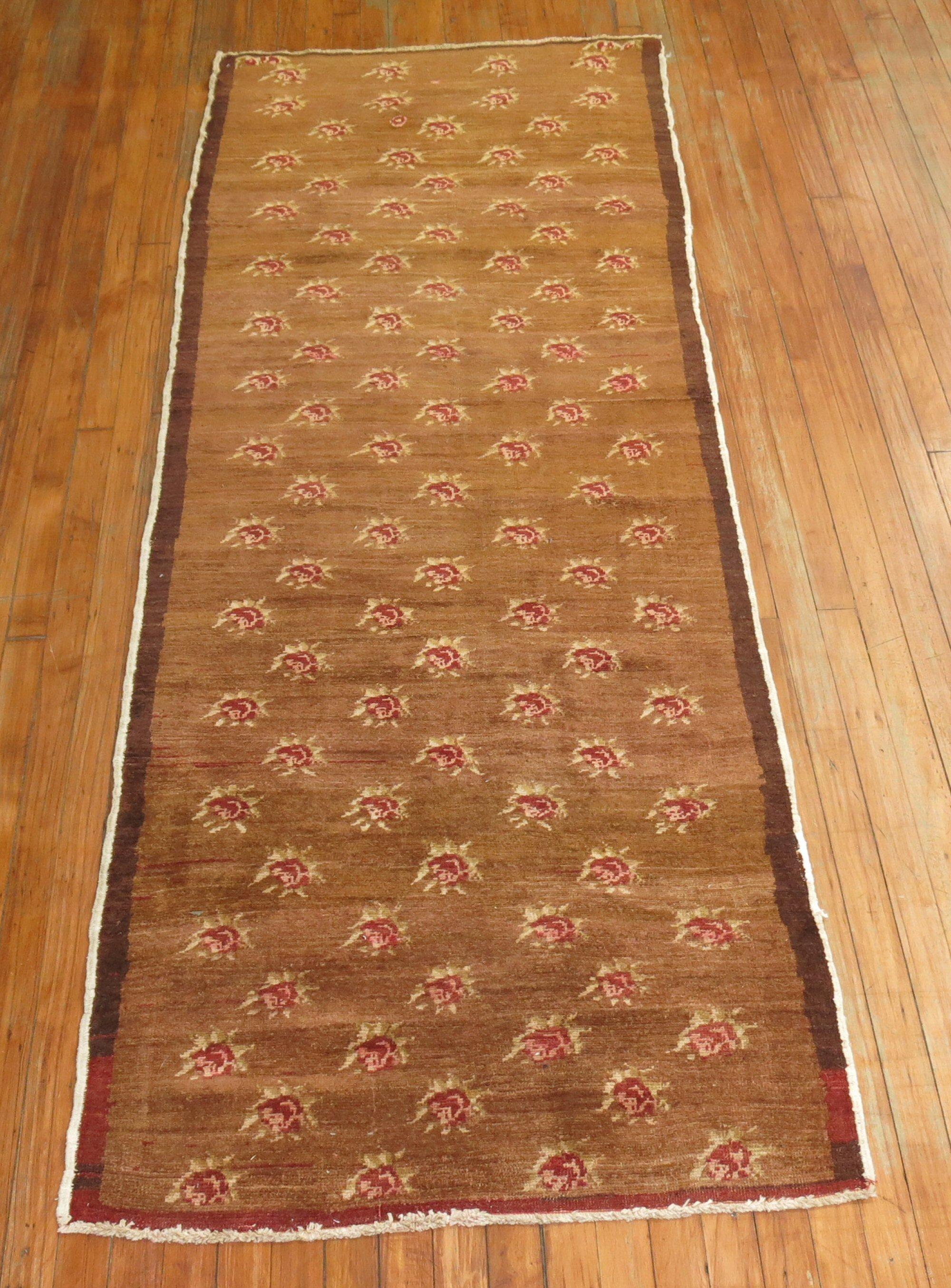 Mid-20th century Turkish runner with an all over repetitive flower design.

2'11'' x 7'8''