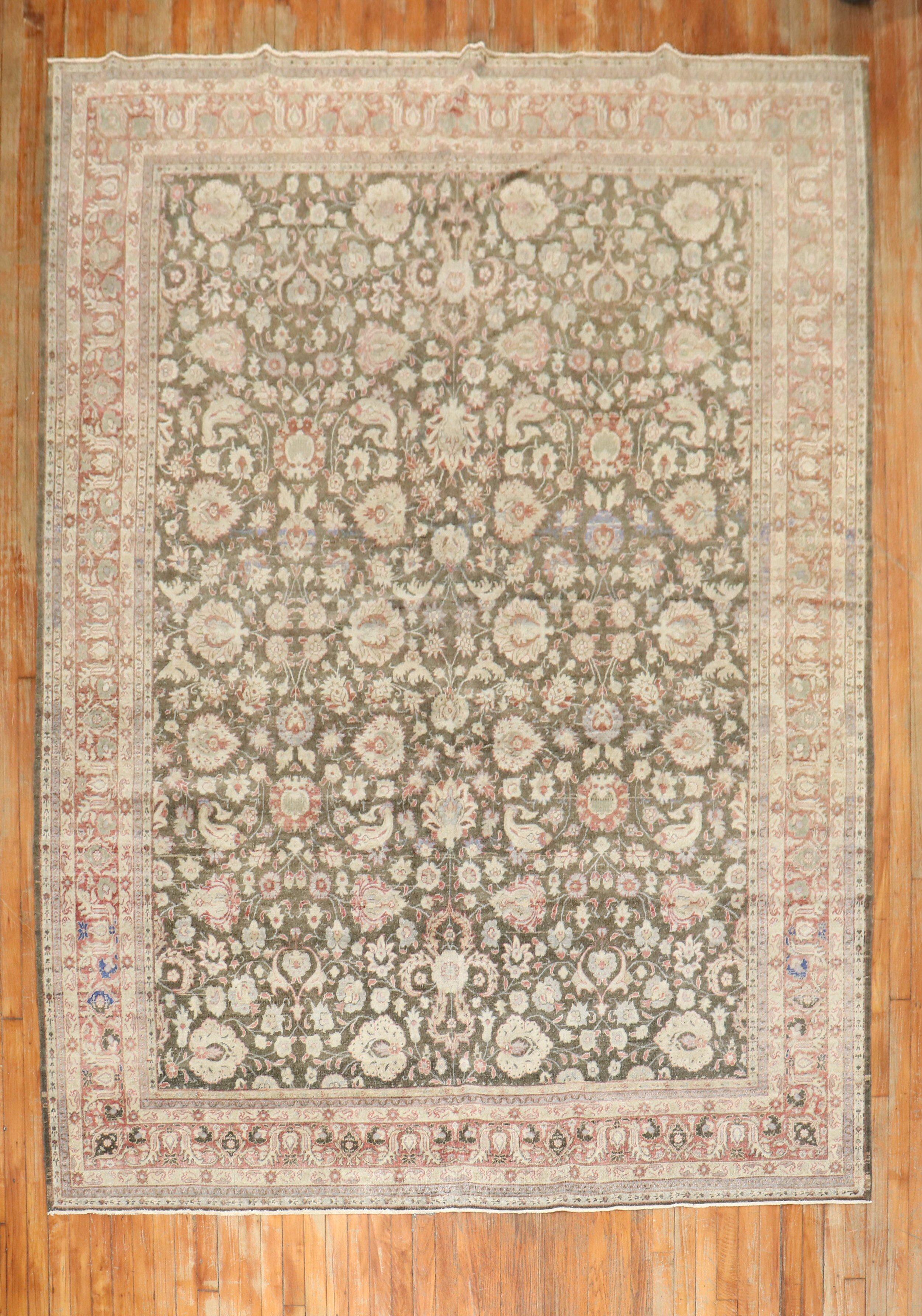 A mid 20th century Turkish Sivas floral pattern rug with a floral field in earth tones

Measures: 7'4'' x 10'5''.