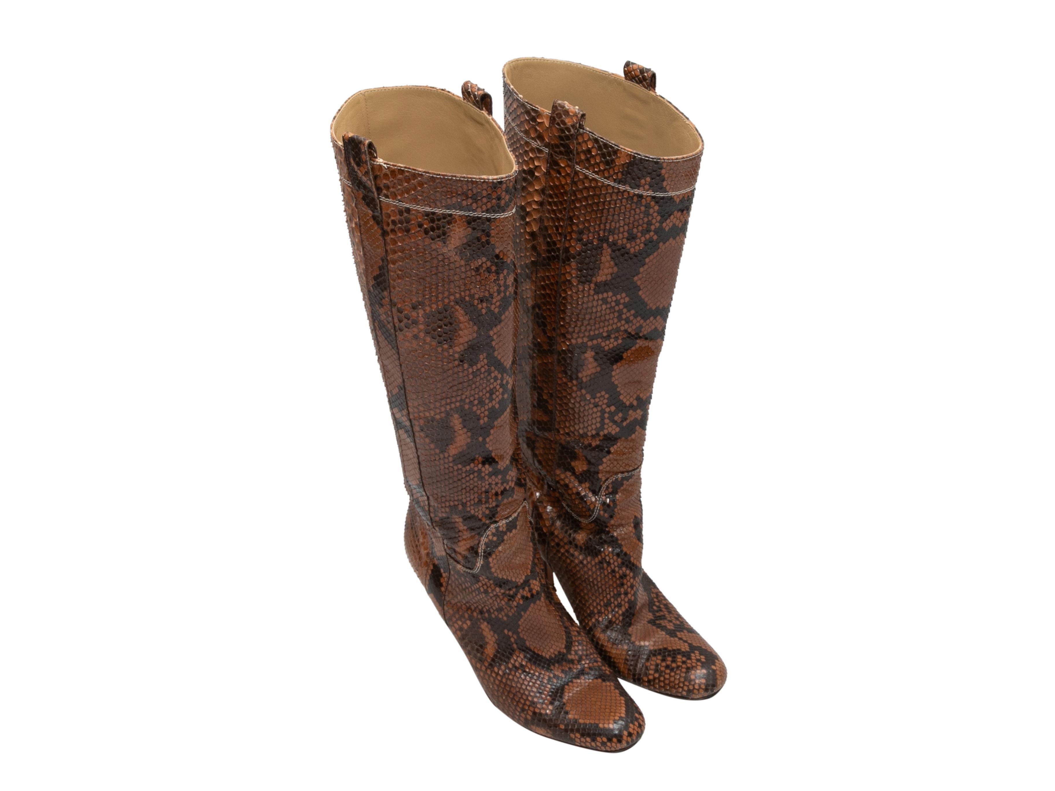 Brown knee-high heeled snakeskin boots by Valentino. Stacked heels. 14.75