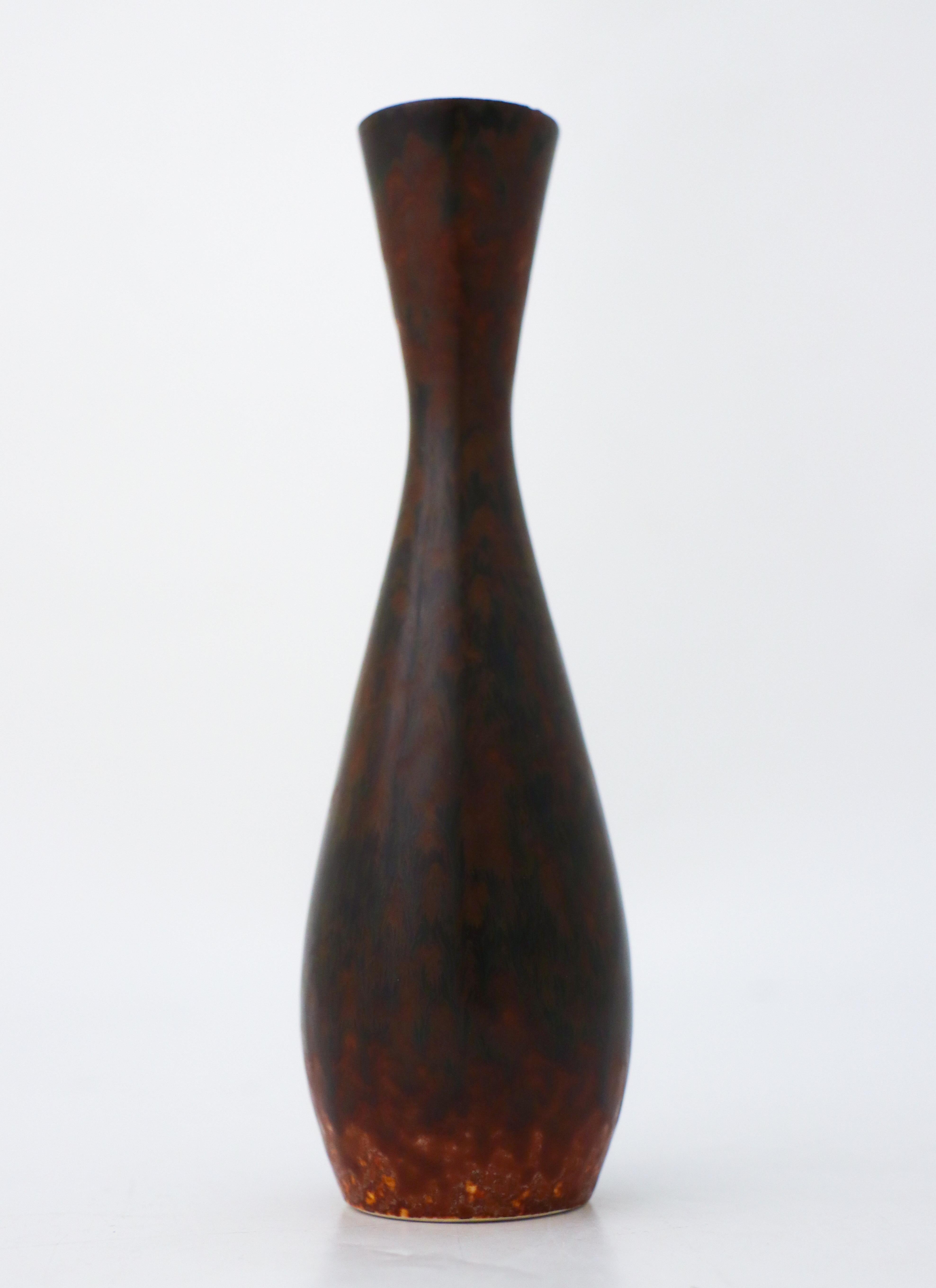 A brown vase designed by Carl-Harry Stålhane at Rörstrand. The vase is 17 cm (6.8