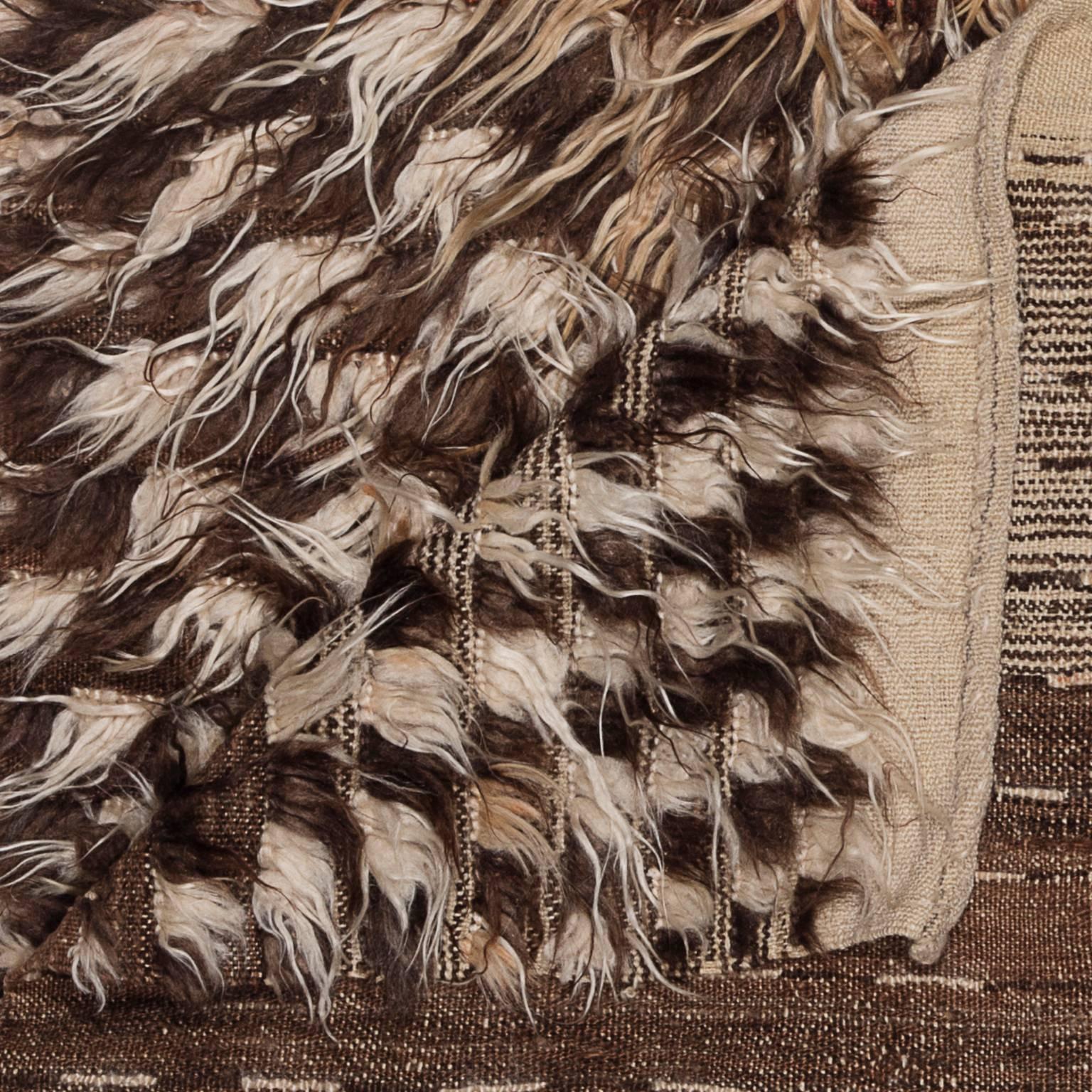 A Filikli's silky pile is handwoven from longhaired goat’s wool. This rug is one-of-a-kind with features that are unique to it alone.