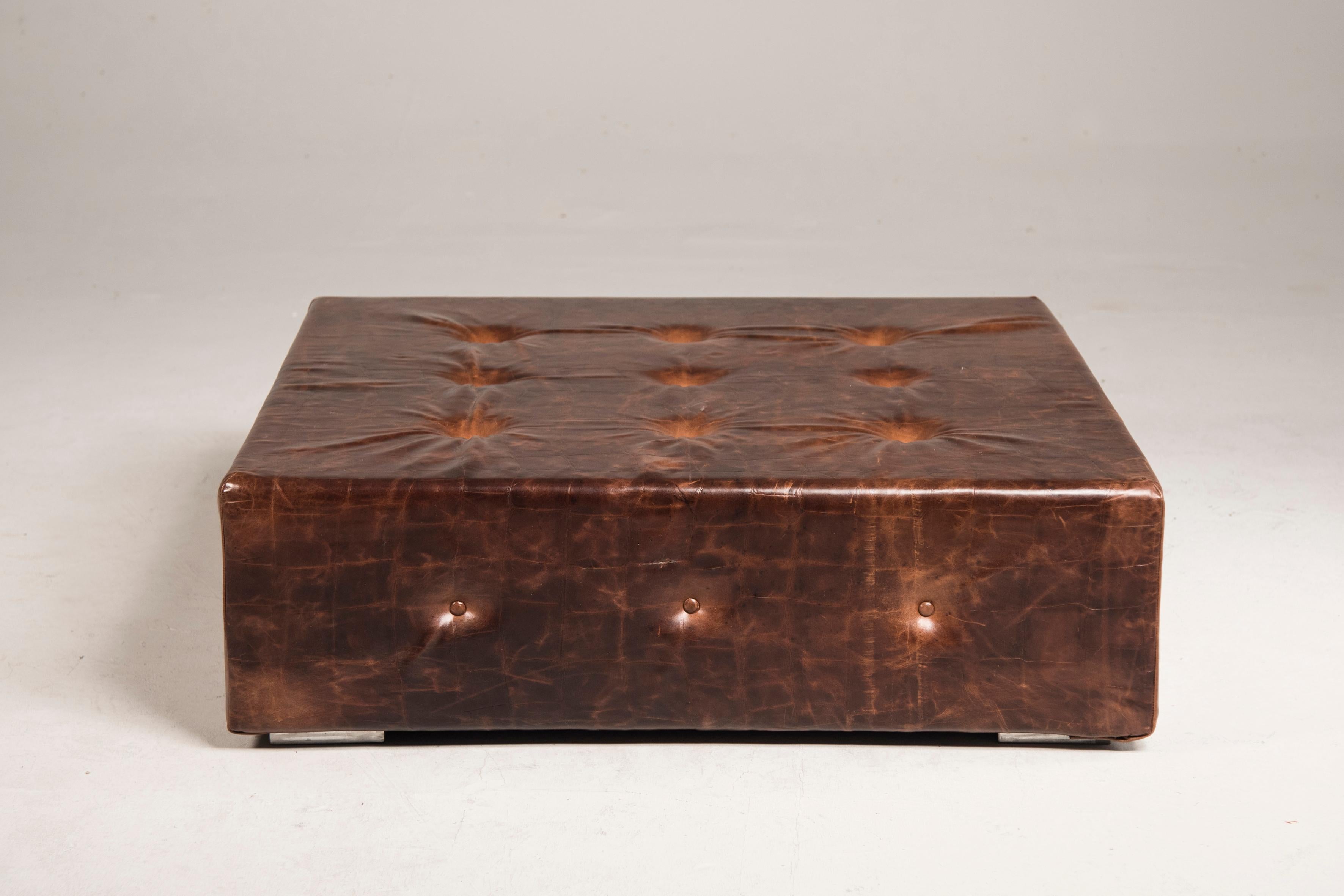 Brown vintage look squared ottoman 
Size to be confirmed: 120 x 120 cm H 40 cm.
 