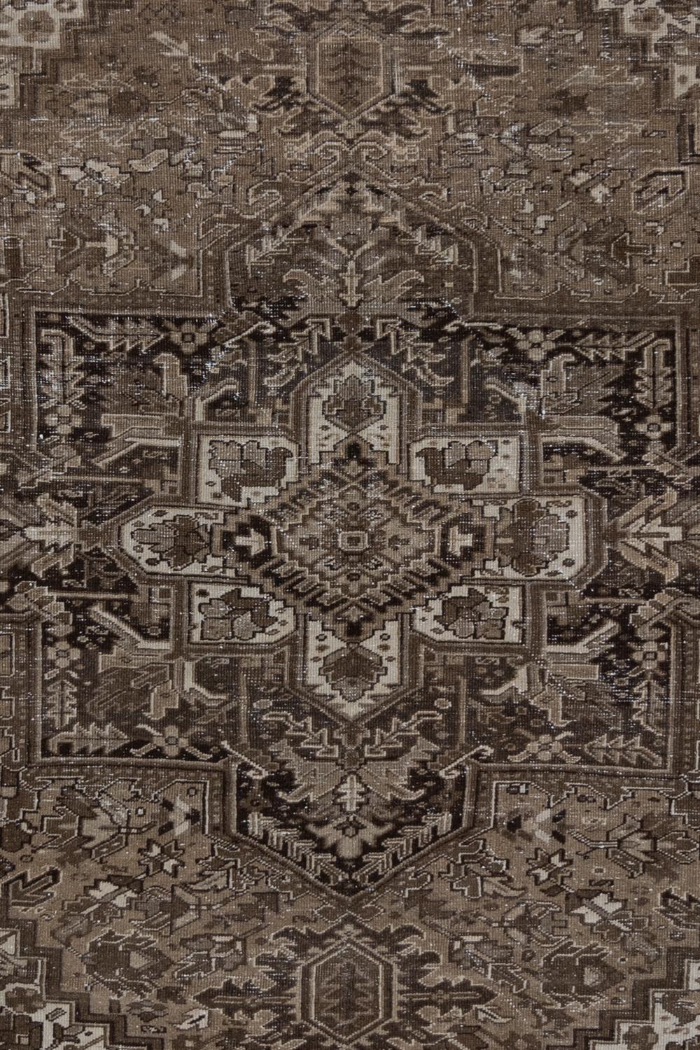 Age: Circa 1930

Colors: brown, taupe, black, off white

Pile: low

Wear Notes: 1

Material: wool on cotton

Vintage rugs are made by hand over the course of months, sometimes years. Their imperfections and wear are evidence of the hard