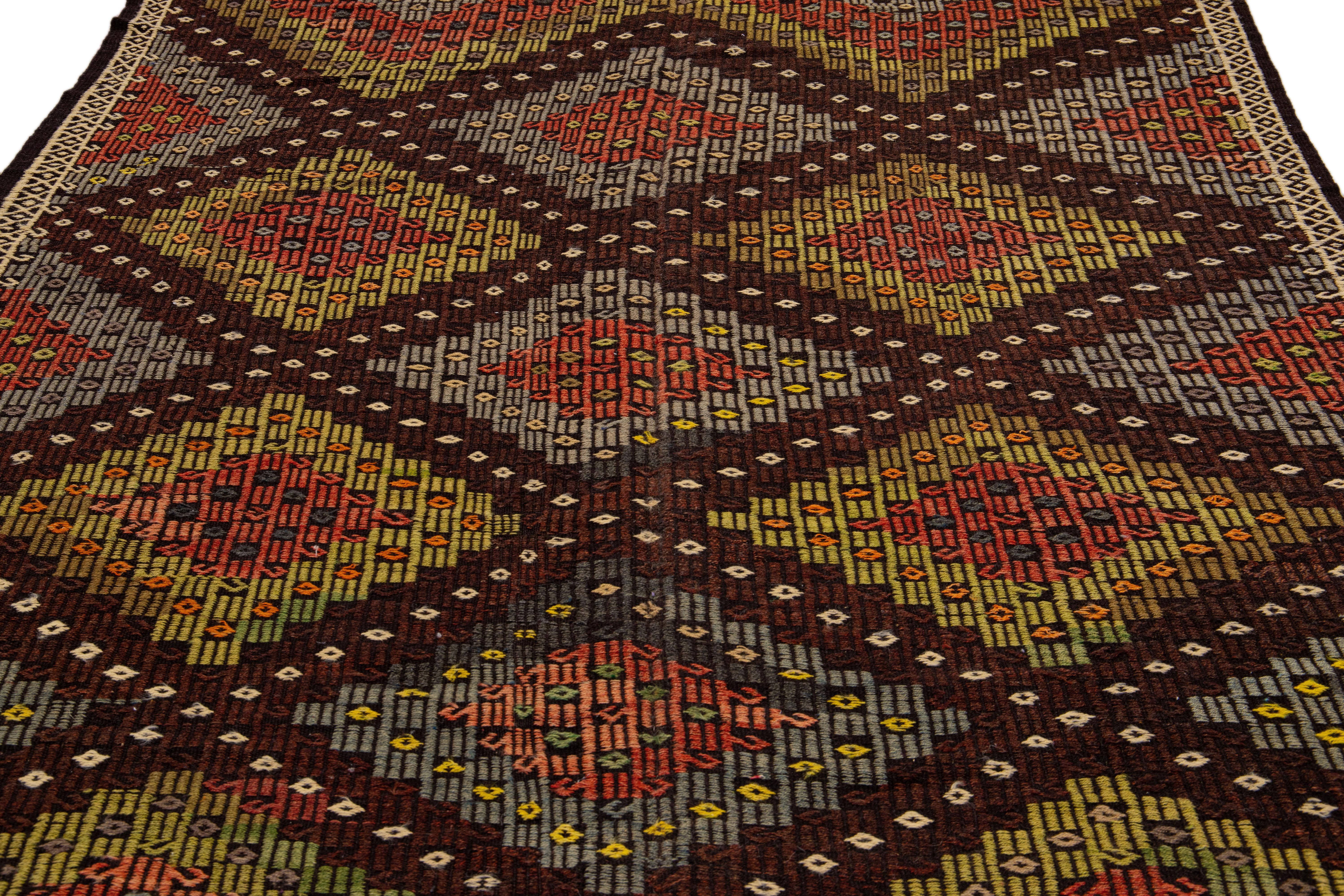 Bohemian Brown Vintage Soumak Handmade Geometric Designed Wool Rug For Sale