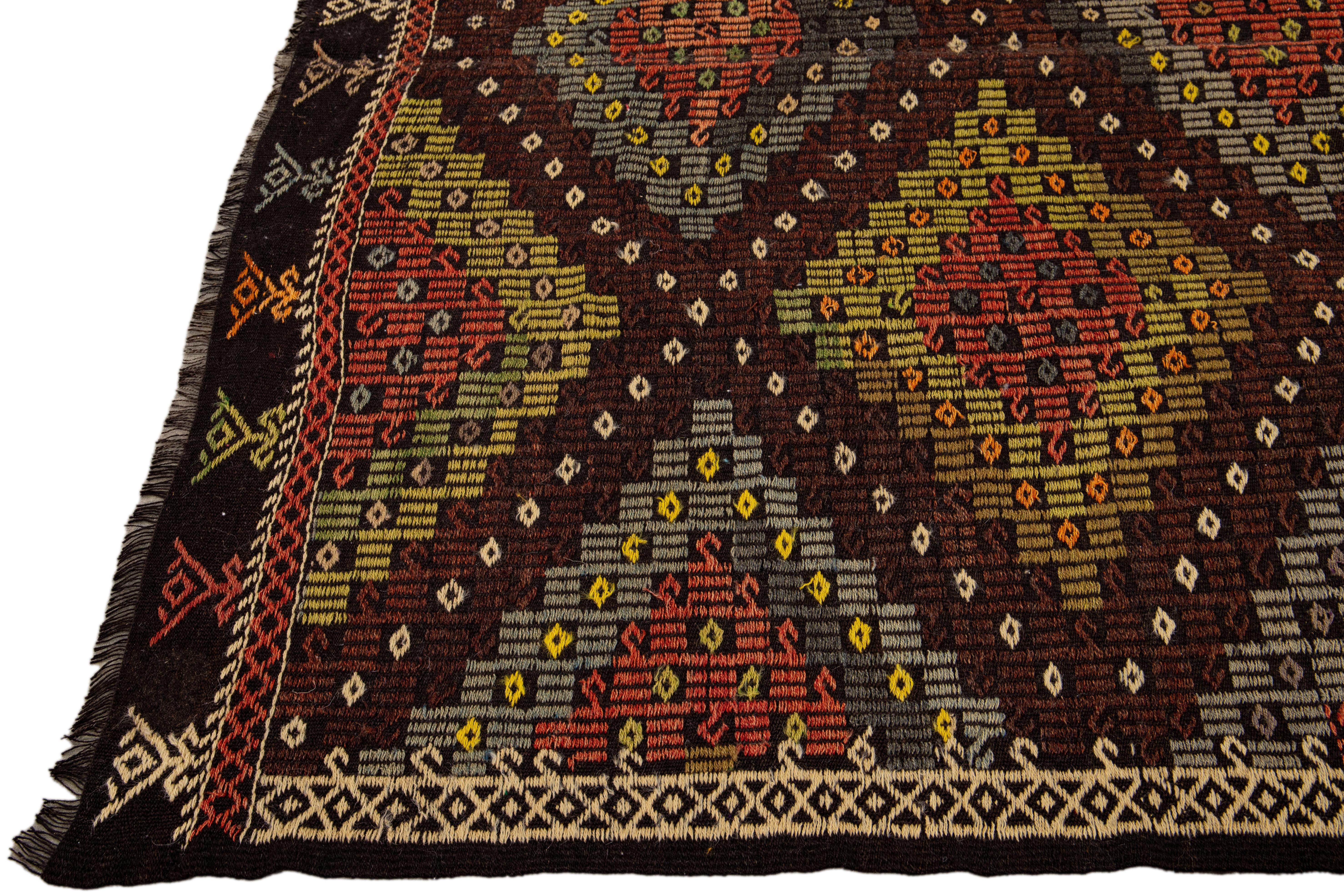 Indian Brown Vintage Soumak Handmade Geometric Designed Wool Rug For Sale
