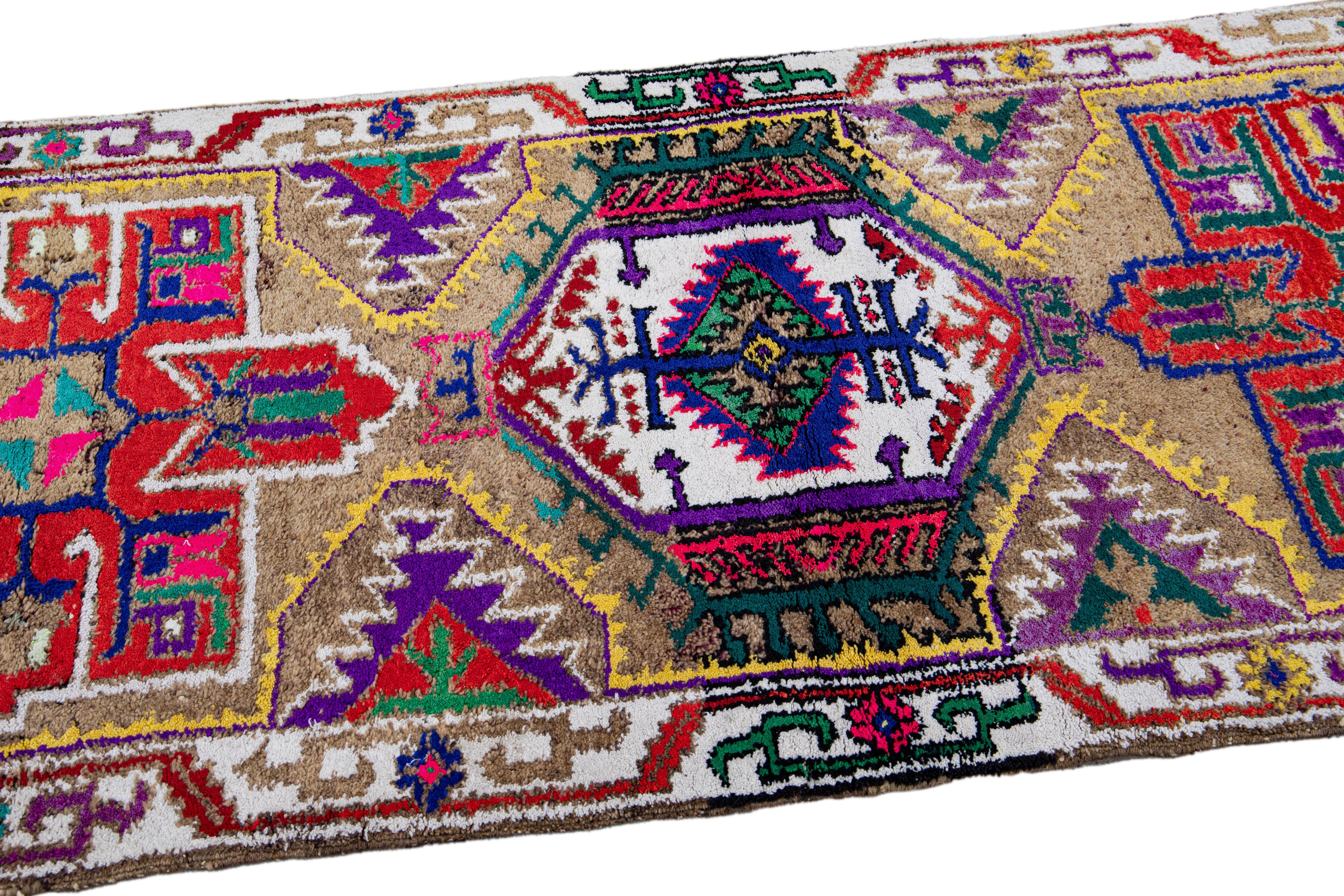 Brown Vintage Turkish Handmade Multicolor Tribal Pattern Wool Runner For Sale 2