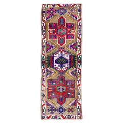 Brauner türkischer handgefertigter Vintage-Läufer aus Wolle mit mehrfarbigem Stammesmuster, braun
