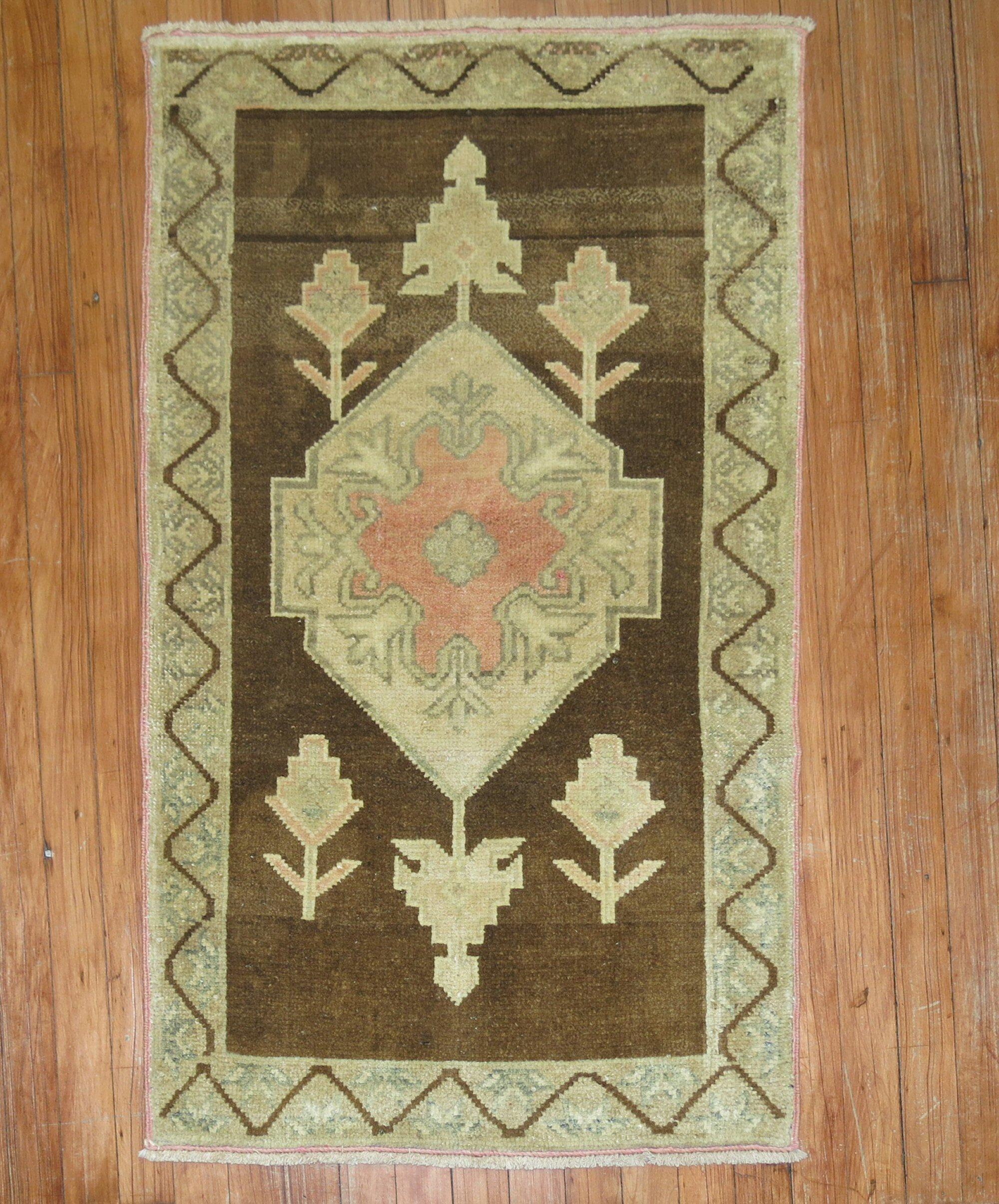 Mid 20th century Turkish rug in brown and neutral tones

Measures: 2'3'' x 3'8''.