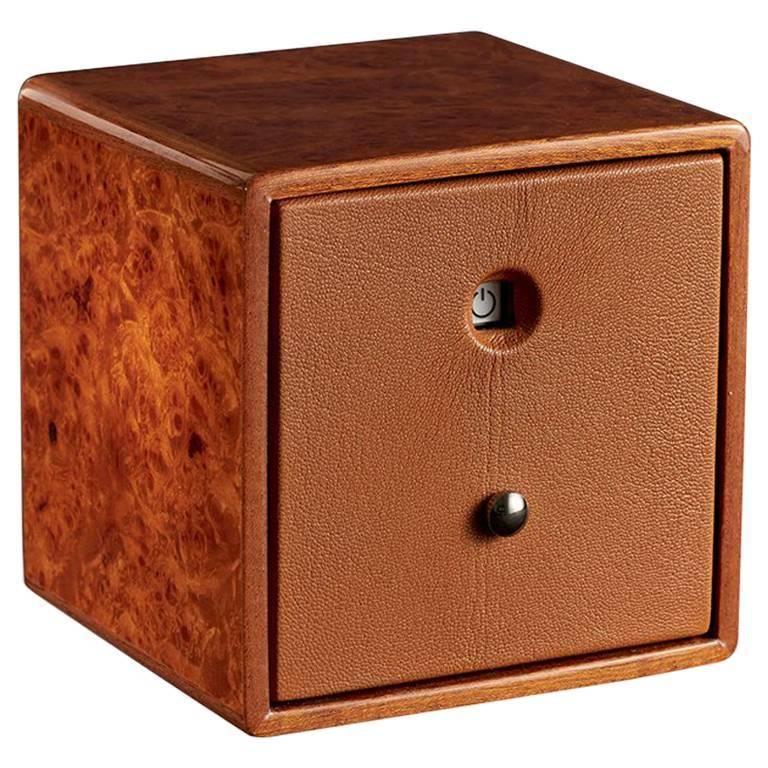Watch winder in polished briar for automatic watch. Leather lined. Winder made in Switzerland, battery operated.

Watch is not included with winder.