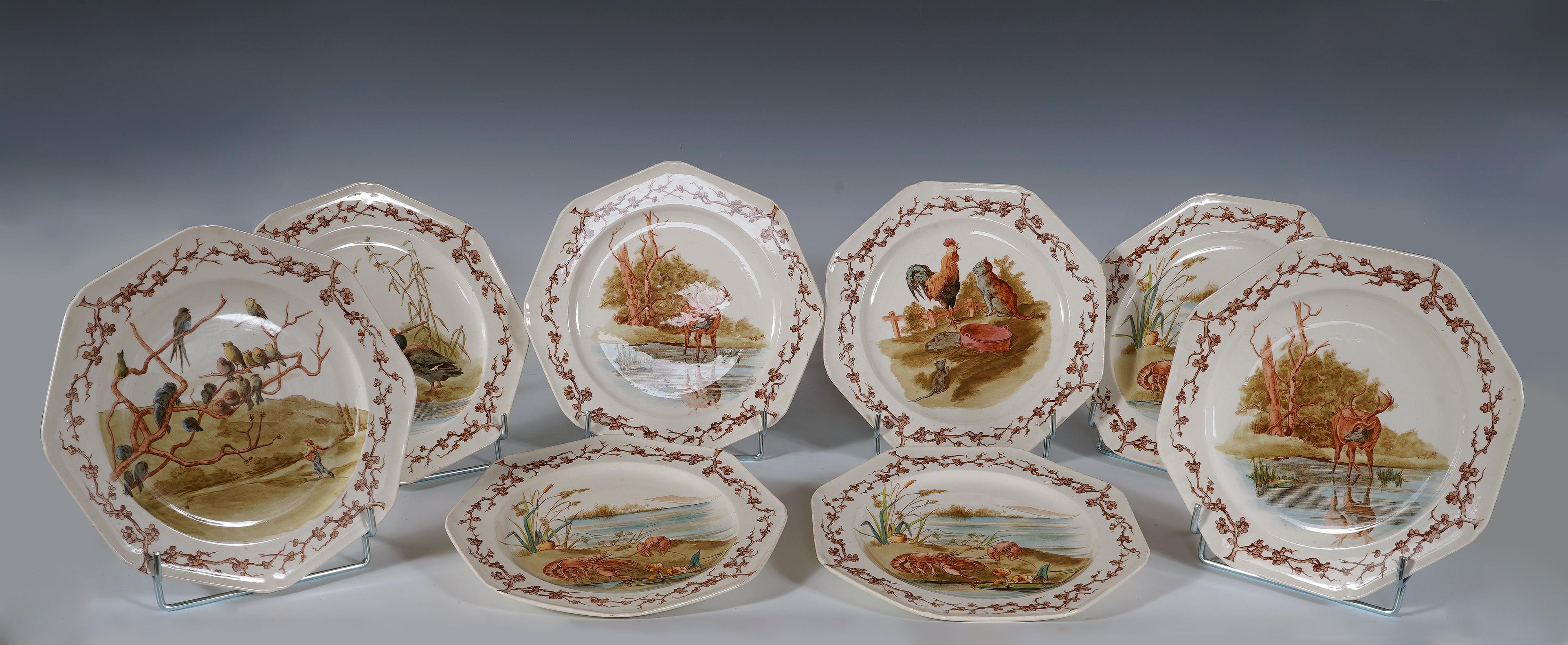 Charming table service consisting of 12 large plates and 4 dessert plates made in ironstone.
Octagonal in shape, each plate illustrates a fable by La Fontaine such as The Crayfish and His Daughter ; The Rooster, the Cat and the Little Mouse ; The