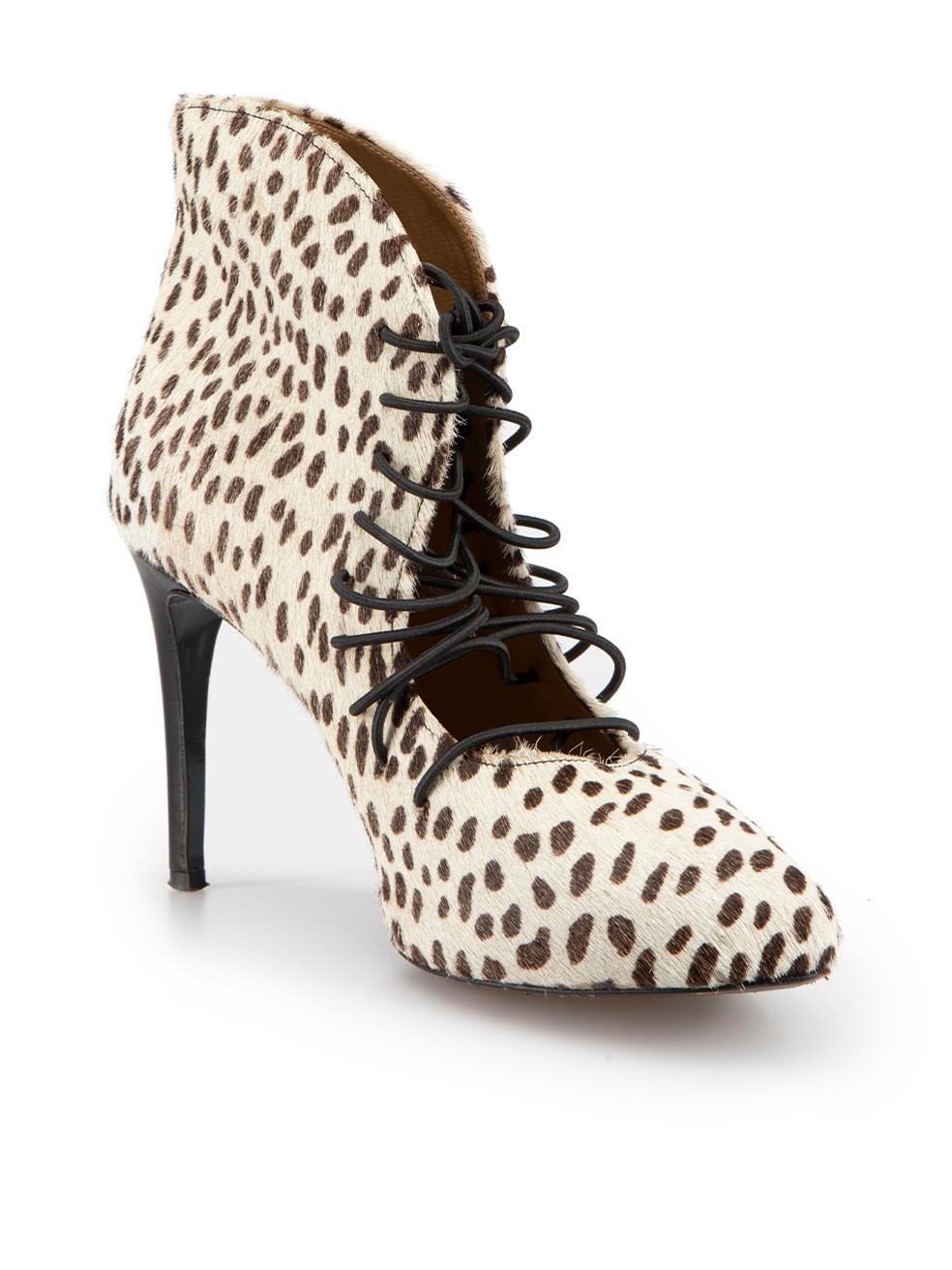 CONDITION is Very good. Minimal wear to exterior of shoes, outsoles show minor signs of wear on this used Acne designer resale item.



Details


Brown and white

Pony hair calfskin

Ankle boots

Animal printed pattern

Almond toe

High heel

Lace