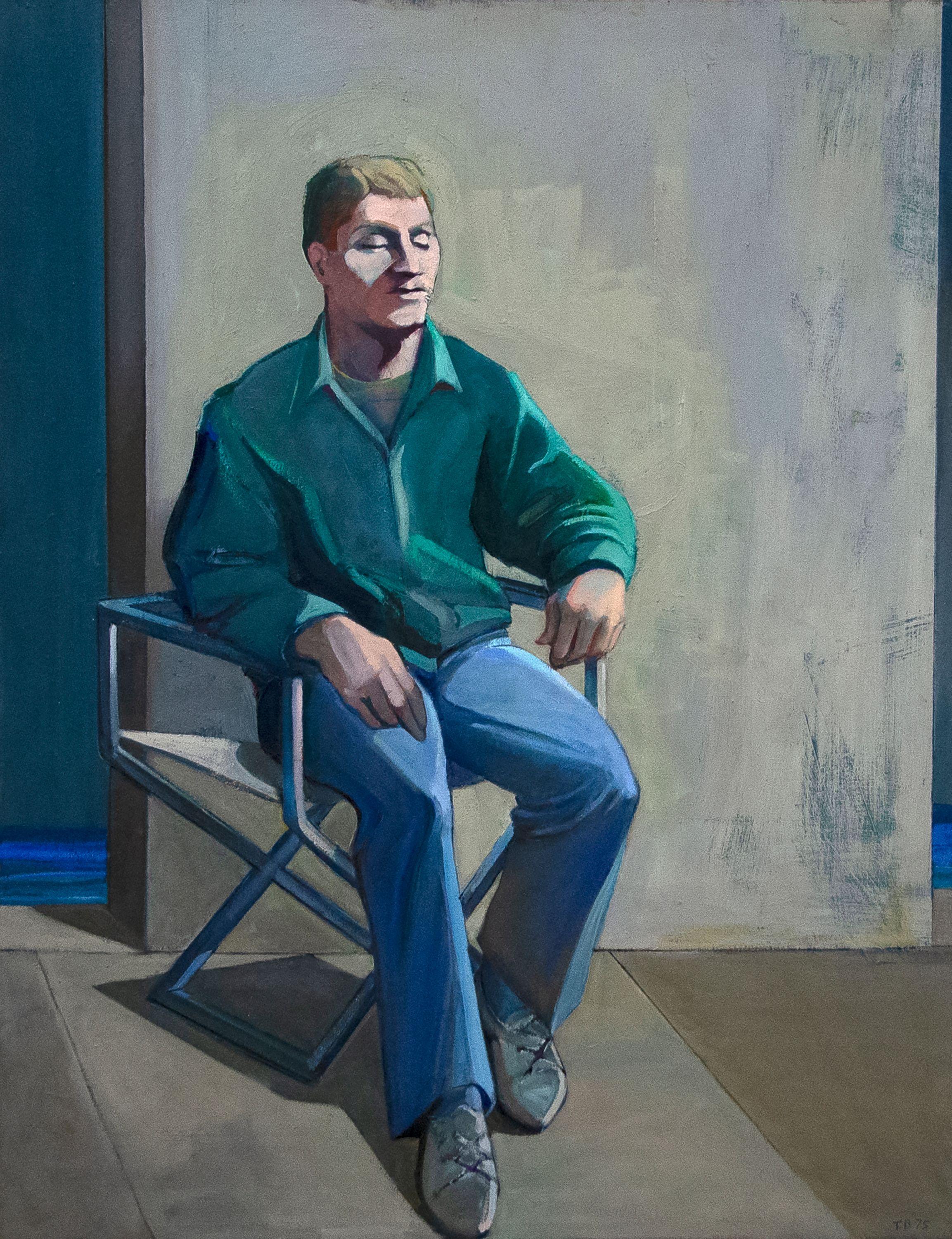 Seated Man in a Green Shirt