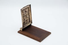 Brown wooden notepad holder with silver accents