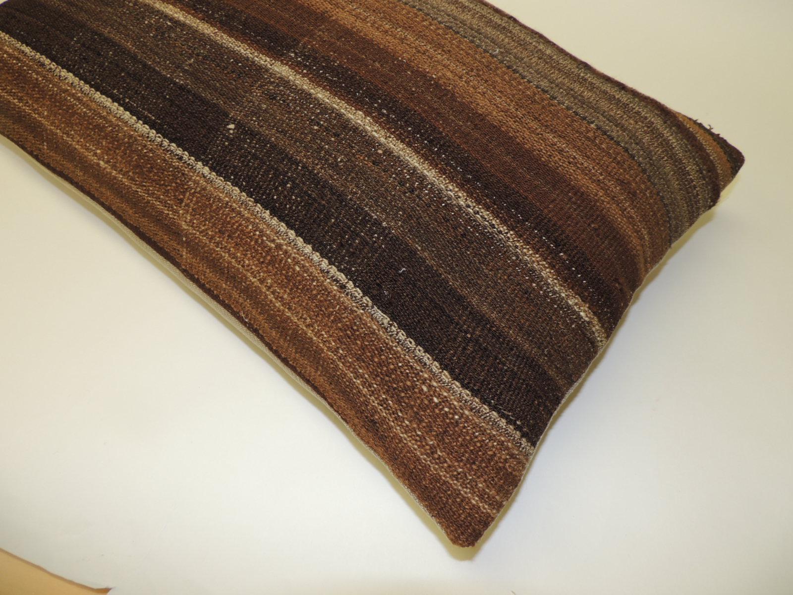 Brown woven Turkish grain sack stripe decorative bolster pillow.
Pillow is backed with tan woven linen. Zipper closure.
Size: 15 x 24 x 6.