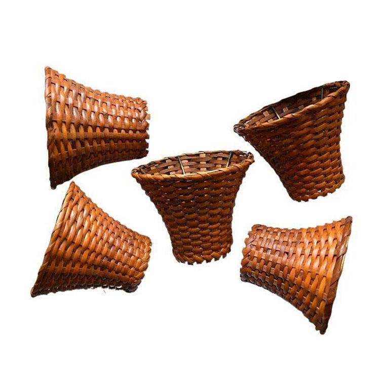 A set of five woven wicker and bamboo chandelier lampshades. This set will be great to add a coastal or traditional vibe tor to update an existing chandelier. 

Dimensions:
5