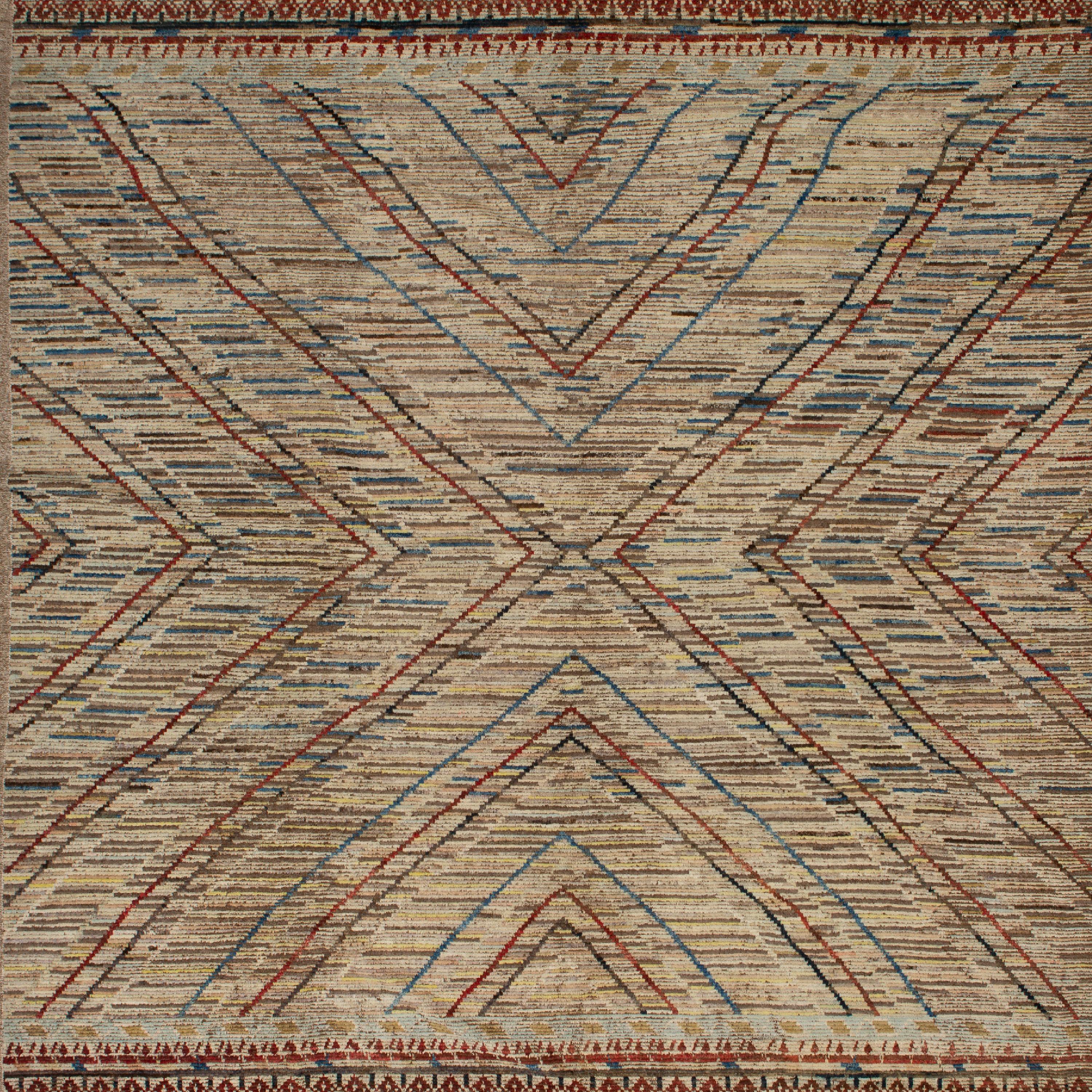 Inspiré par les fondements des couleurs naturelles et des matériaux purs de la Terre, ce tapis géométrique en laine multicolore Zameen - 12'6