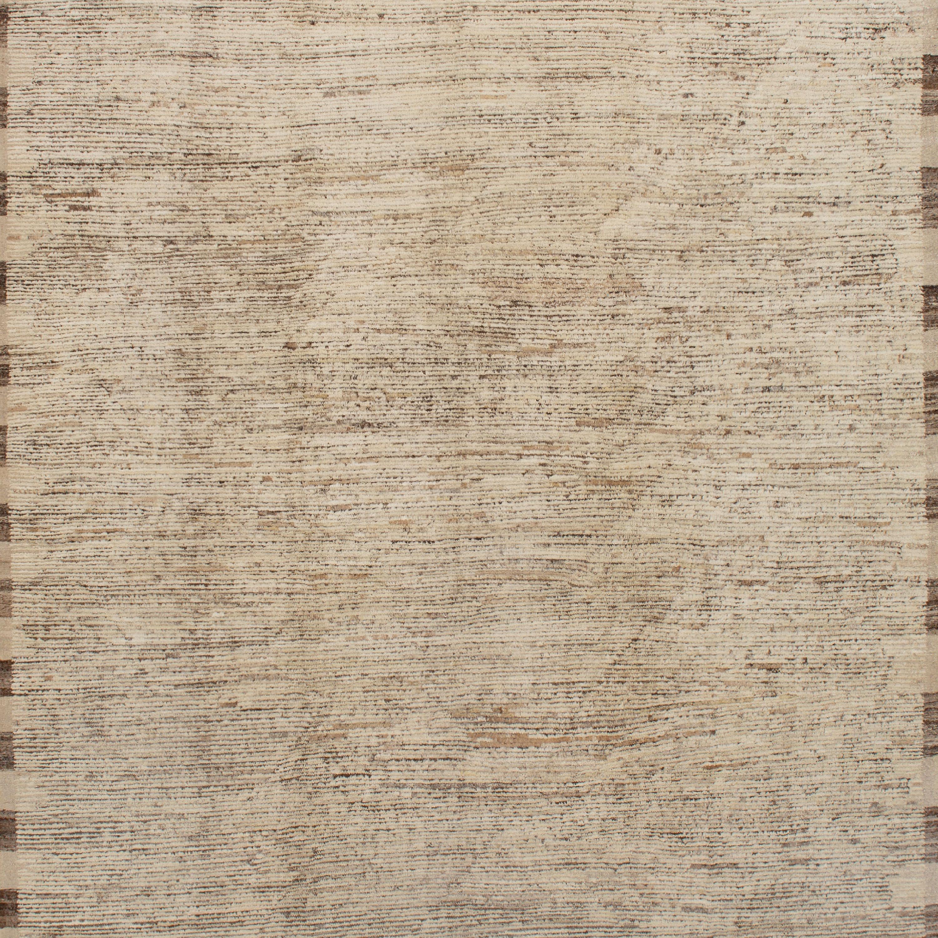 Inspiré par les fondements des couleurs naturelles et des matériaux purs de la Terre, ce tapis moderne en laine Zameen Brown and White - 9'8