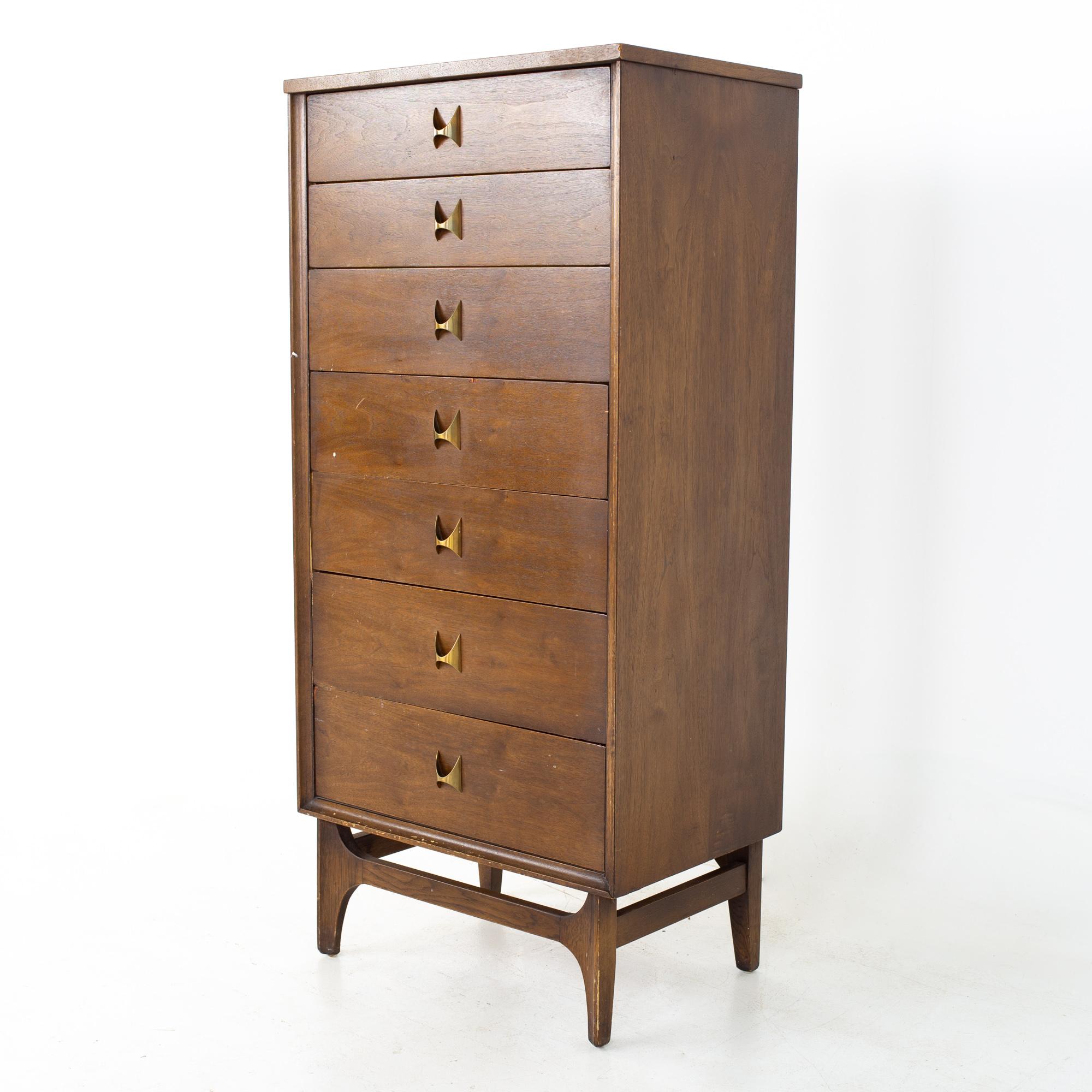 Broyhill Brasilia Brutalist mid century walnut and brass lingerie chest.
Chest measures: 24 wide x 16 deep x 51 inches high

All pieces of furniture can be had in what we call restored vintage condition. That means the piece is restored upon