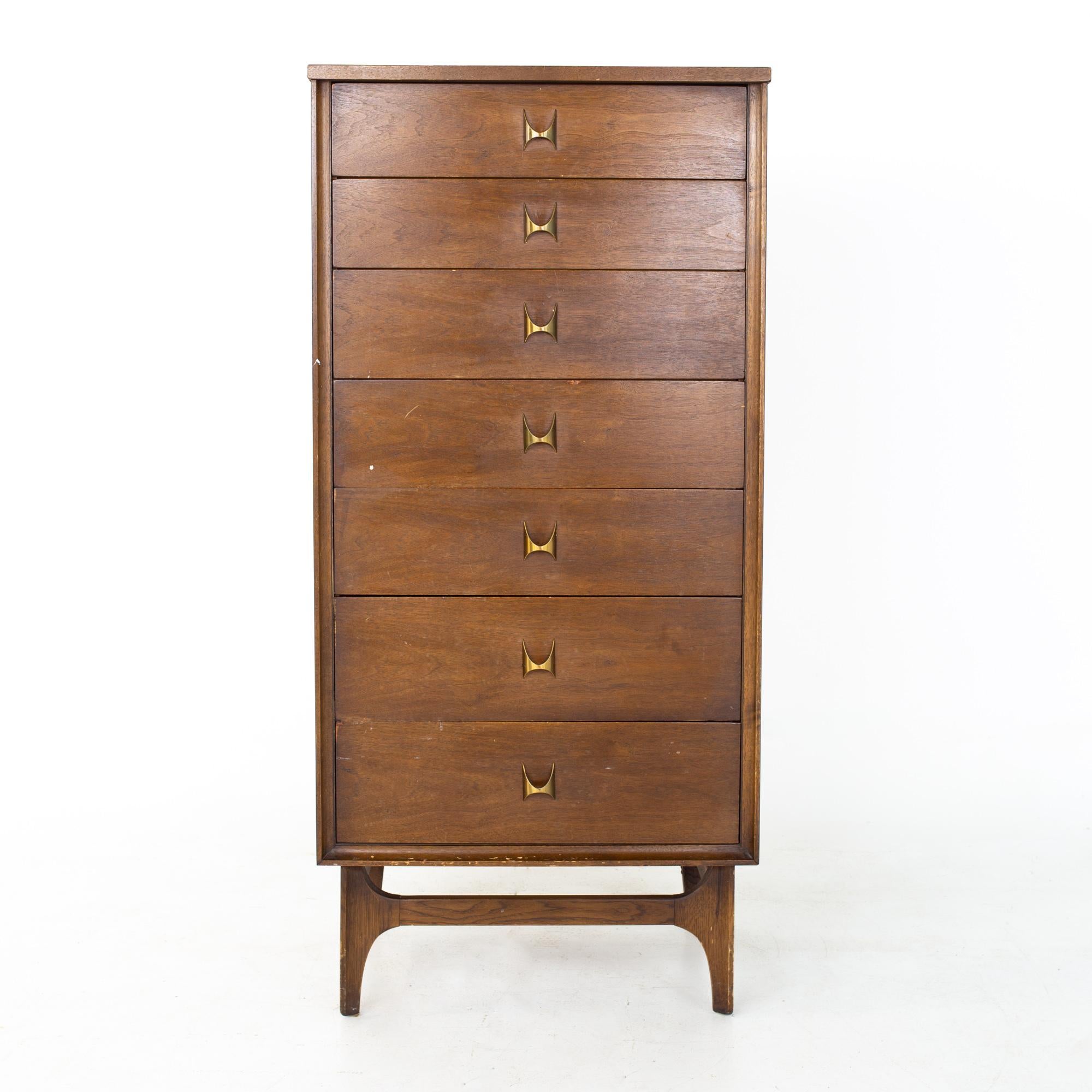 Broyhill Brasilia Brutalist mid century walnut and brass lingerie chest

Chest measures: 24 wide x 16 deep x 52 inches high

All pieces of furniture can be had in what we call restored vintage condition. That means the piece is restored upon