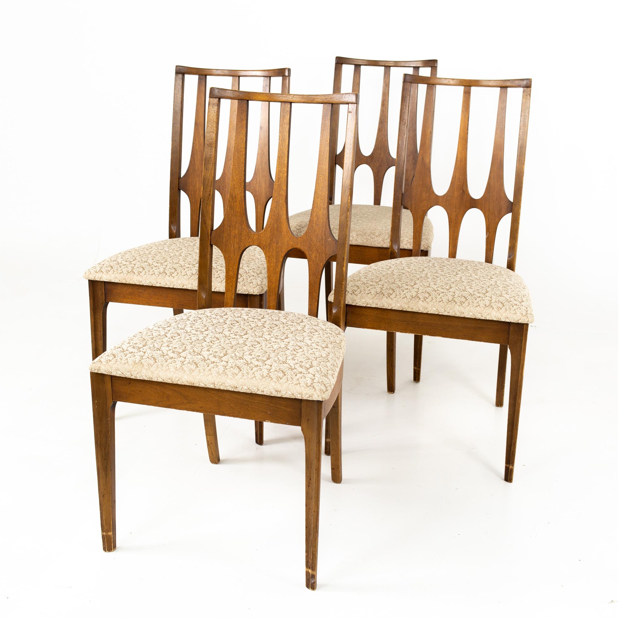 Broyhill Brasilia Brutalist mid century walnut dining chairs - Set of 4
Each chair measures: 20 wide x 22.25 deep x 38 high, with a seat height of 18.25 inches

All pieces of furniture can be had in what we call restored vintage condition. That