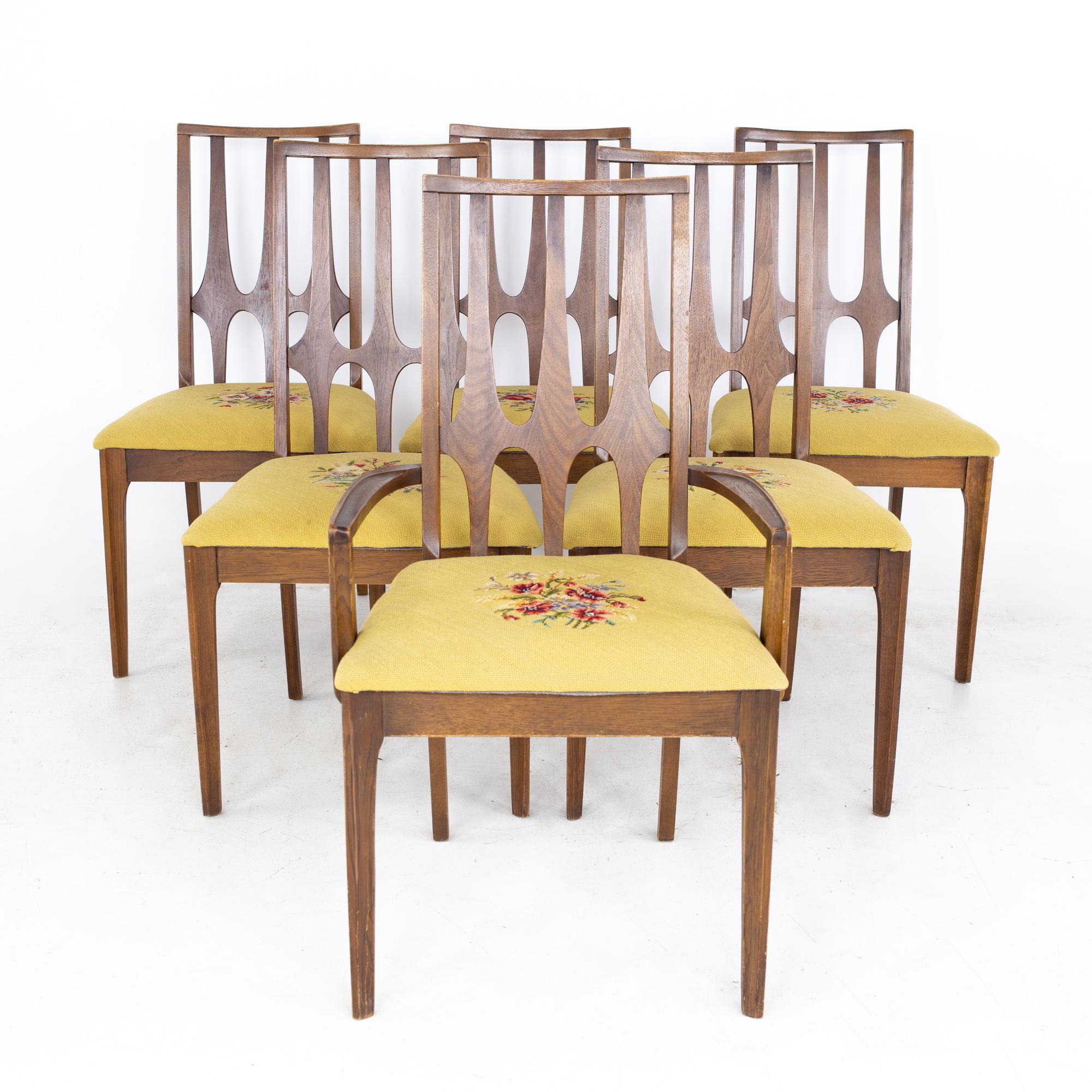 Broyhill Brasilia Brutalist mid century walnut dining chairs - set of 6
Each chair measures: 20 wide x 18.5 deep x 37.5 high, with a seat height of 18.5 inches and arm height of 23.5 inches. Along with a chair clearance of 23.5 inches

All pieces