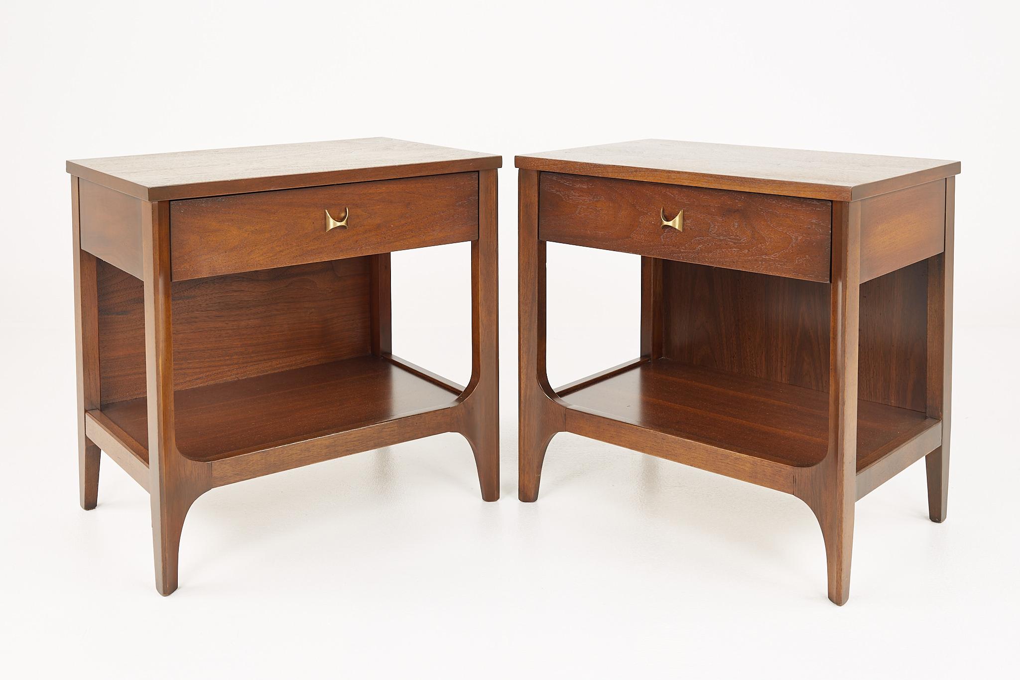 Broyhill Brasilia Brutalist mid century walnut nightstands - pair 

Each nightstand measures: 22 wide x 15 deep x 22 inches high

All pieces of furniture can be had in what we call restored vintage condition. That means the piece is restored