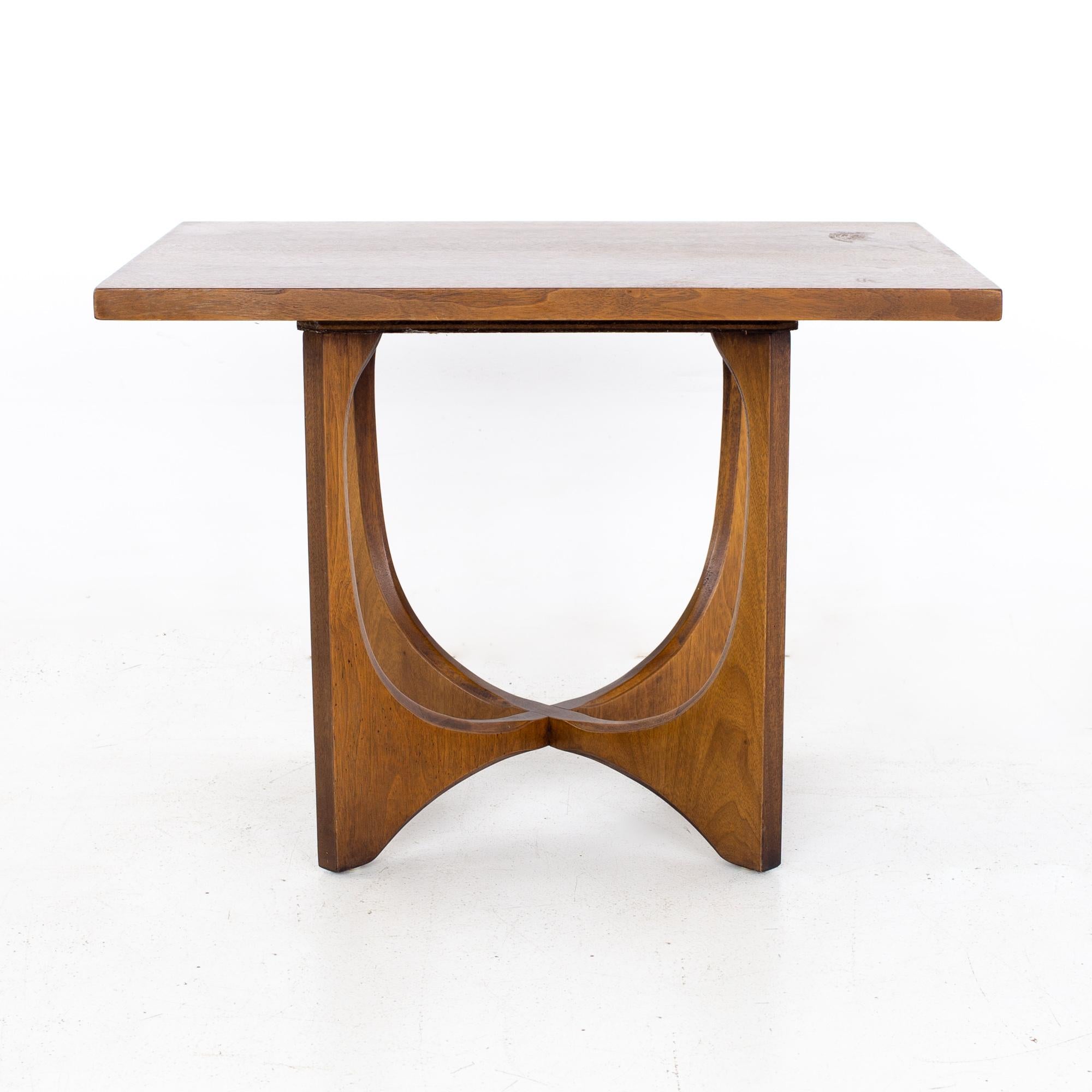 Broyhill Brasilia Brutalist mid century walnut side end table
Table measures: 28 wide x 20 deep x 20 inches high

All pieces of furniture can be had in what we call restored vintage condition. That means the piece is restored upon purchase so