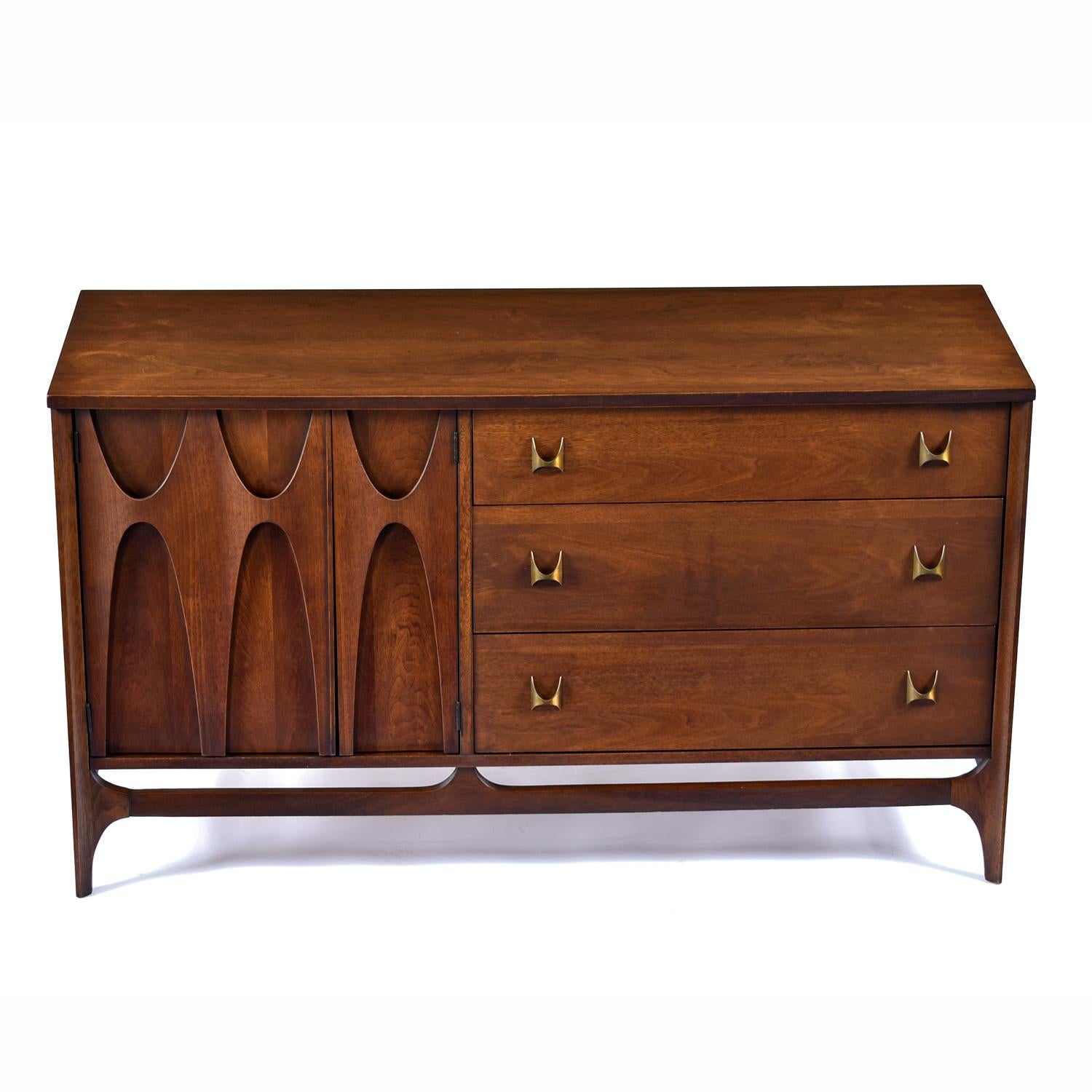 This Brasilia Credenza was delicately restored to preserve the original patina. The Brasilia line has elevated to a high-end status that has made these pieces very sought after and subsequently harder to find. We love this line and have never seen