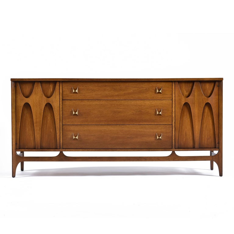 This Brasilia Credenza was delicately restored to preserve the original patina. The Brasilia line has elevated to a high-end status that has made these pieces very sought after and subsequently harder to find. We love this line and have never seen
