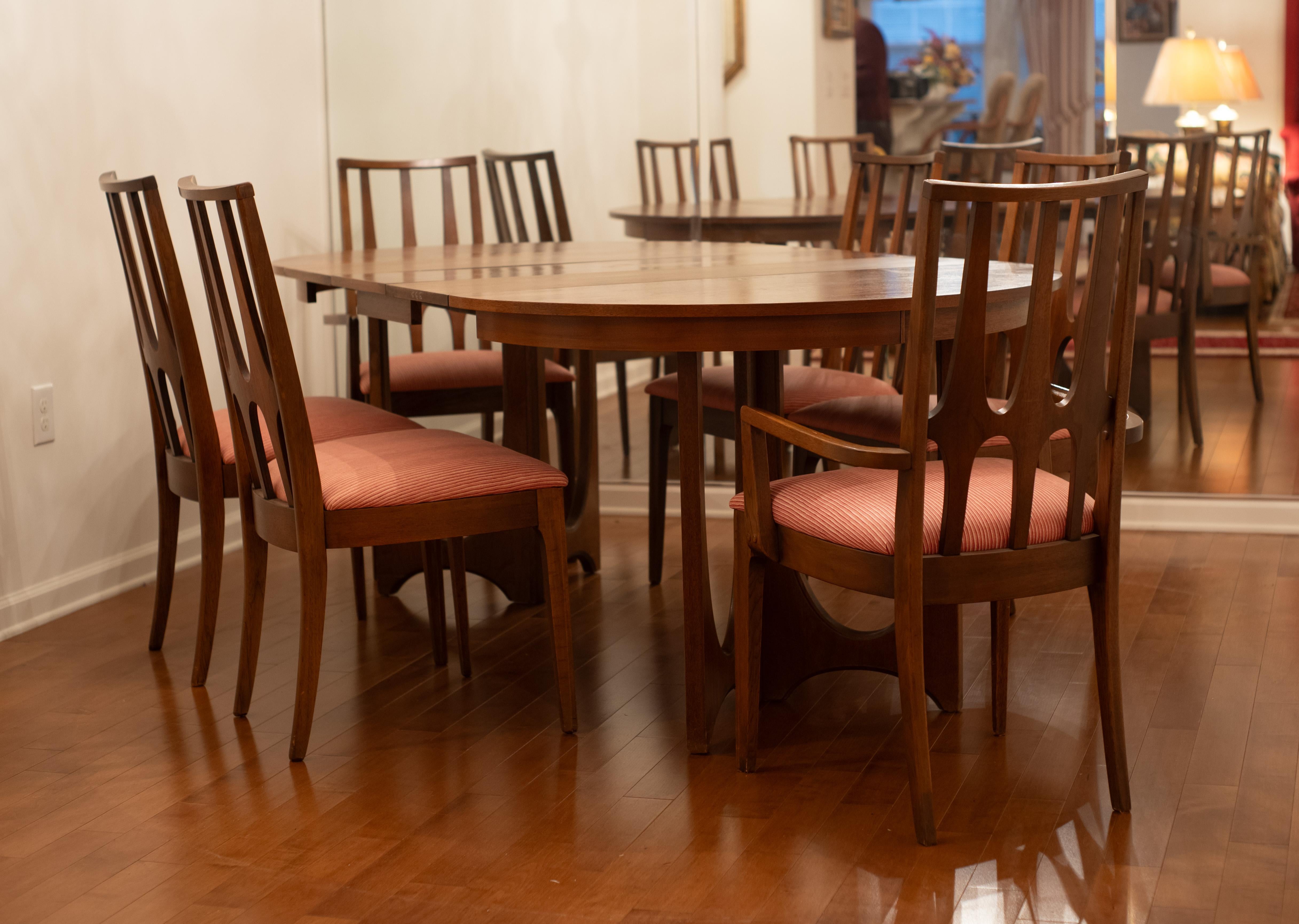 Wonderful dining set by Broyhill Brasilia. This set includes the classic Brasilia base table with three 12